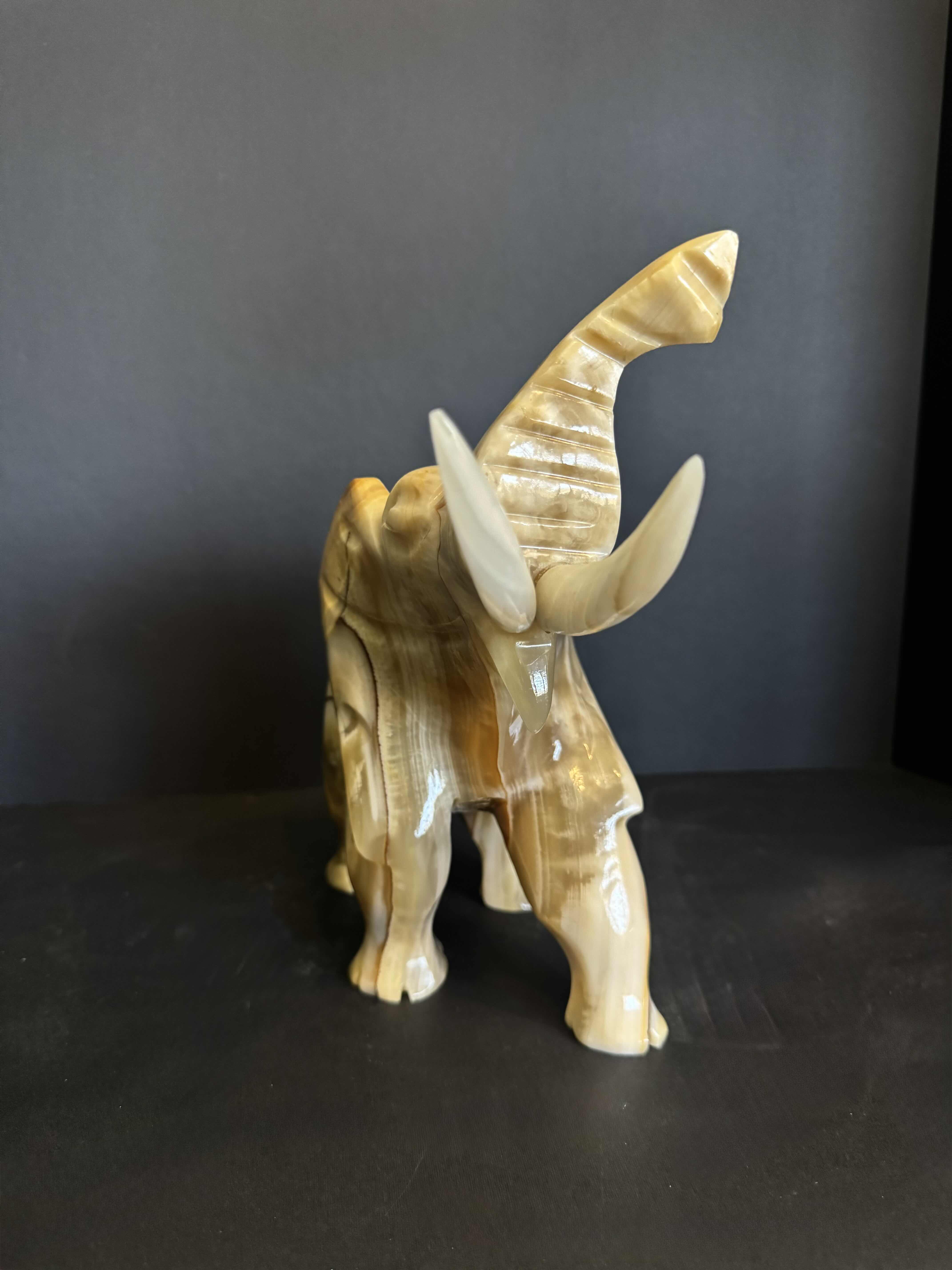 Photo 1 of  HAND CARVED ELEPHANT FIGURINE MADE OF MARBLE ONYX STONE.9”H X 10”W