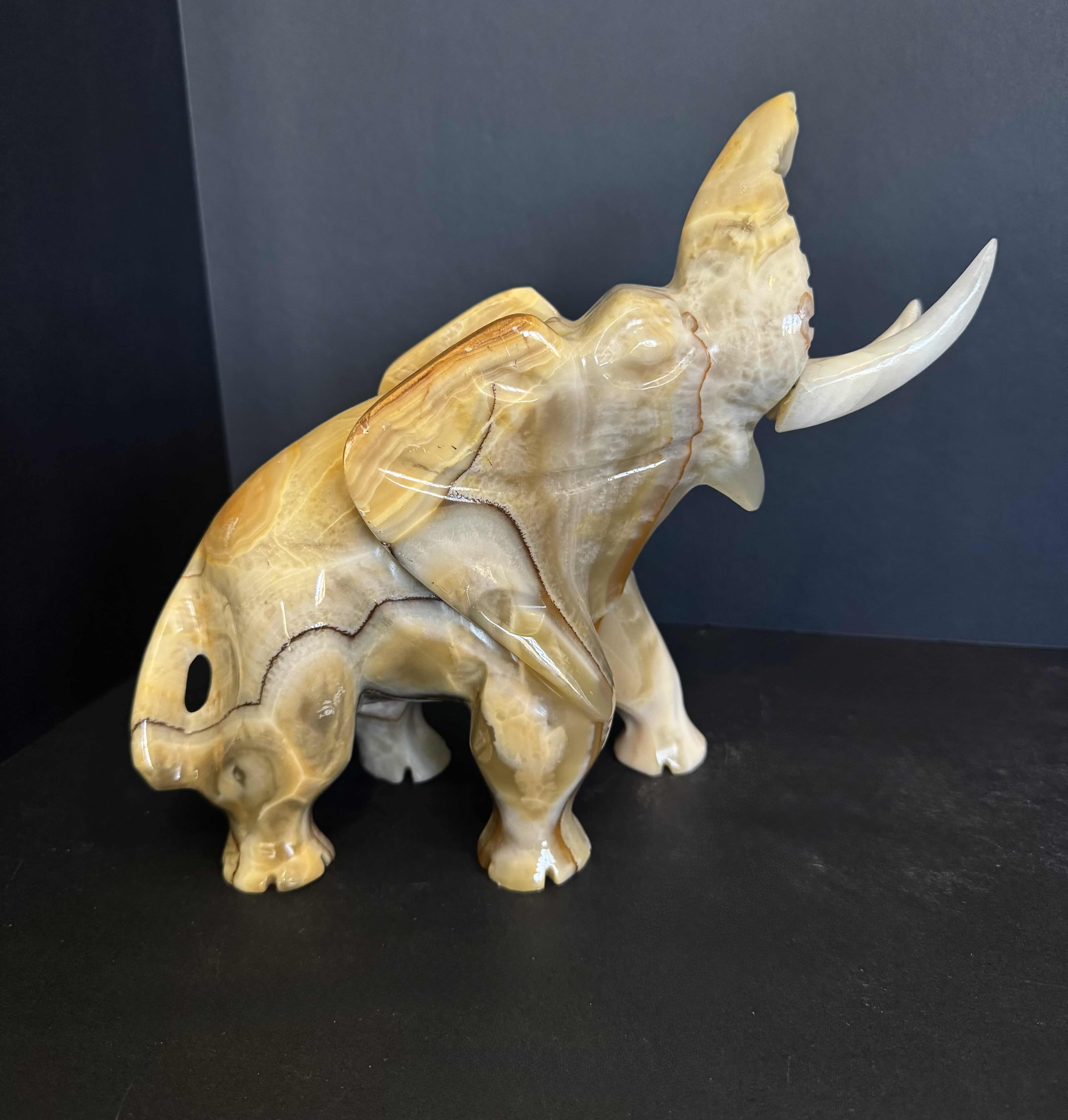 Photo 1 of  HAND CARVED ELEPHANT FIGURINE MADE OF MARBLE ONYX STONE.9”H X 10”W