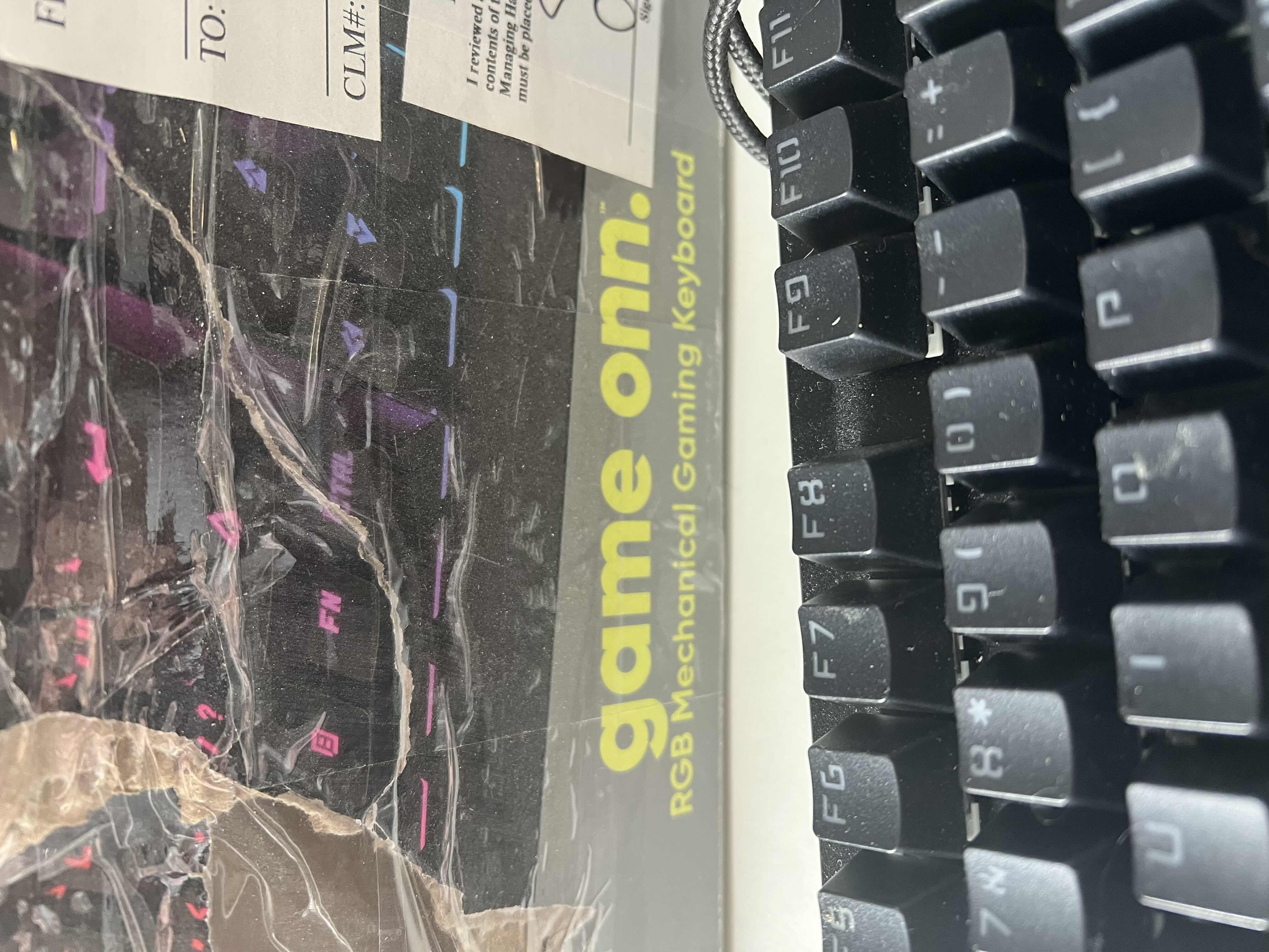 Photo 1 of GAME ONN GAMING KEYBOARD. LIGHT UP MULTI COLORED KEYS.