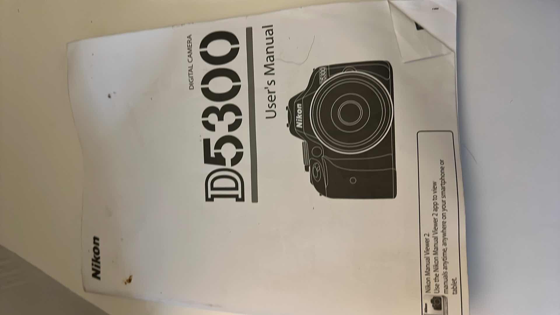 Photo 1 of NIKON D5300 CAMERA WITH PROTECTIVE RUBBER CASE. WITH TELEPHOTO LENS.