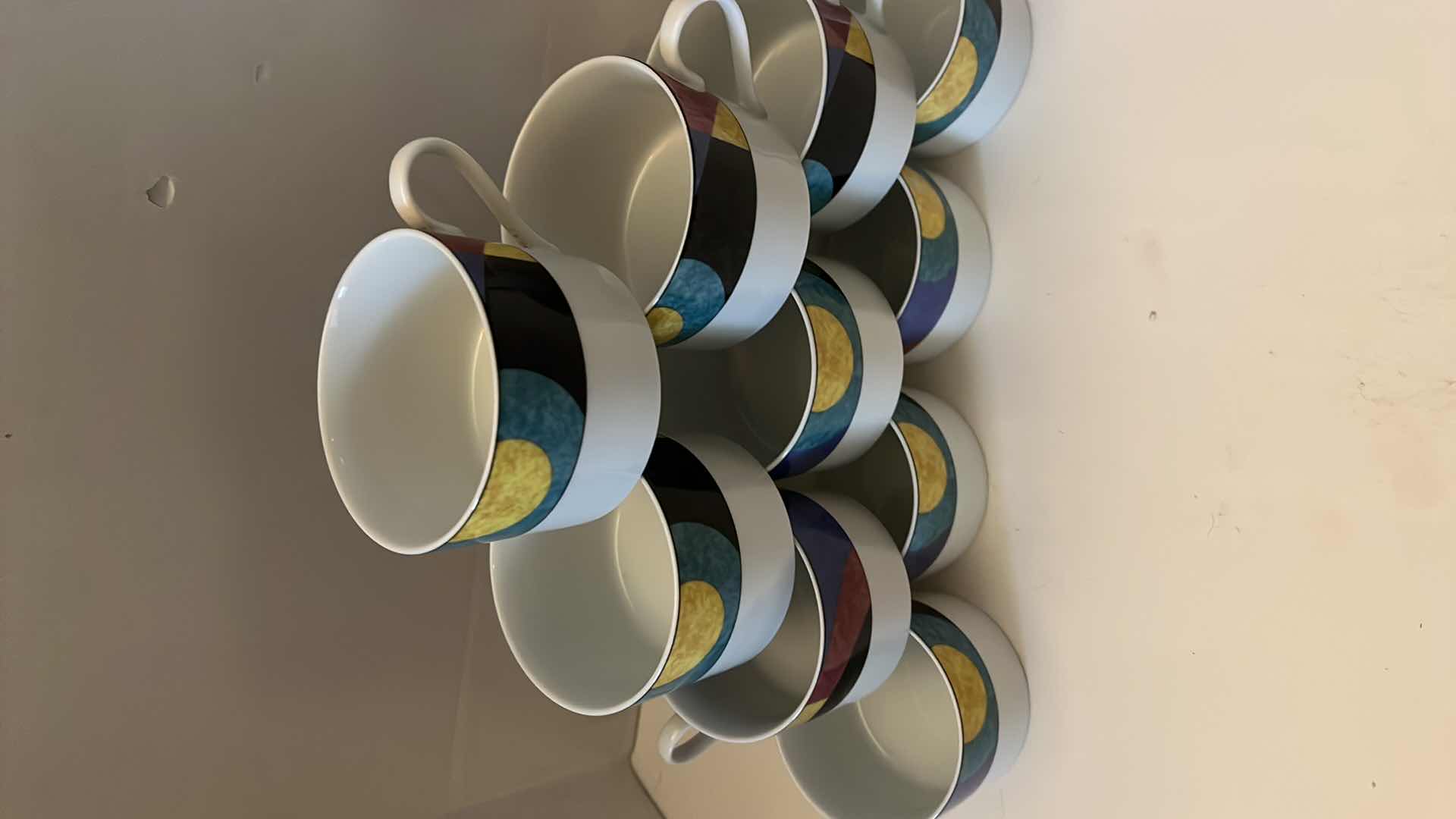 Photo 1 of MIKASA "CURRENTS" FLAT PORCELAIN TEA CUPS. PART OF DISHWARE SET(SOLD SEPARATELY). 2 1/4"H