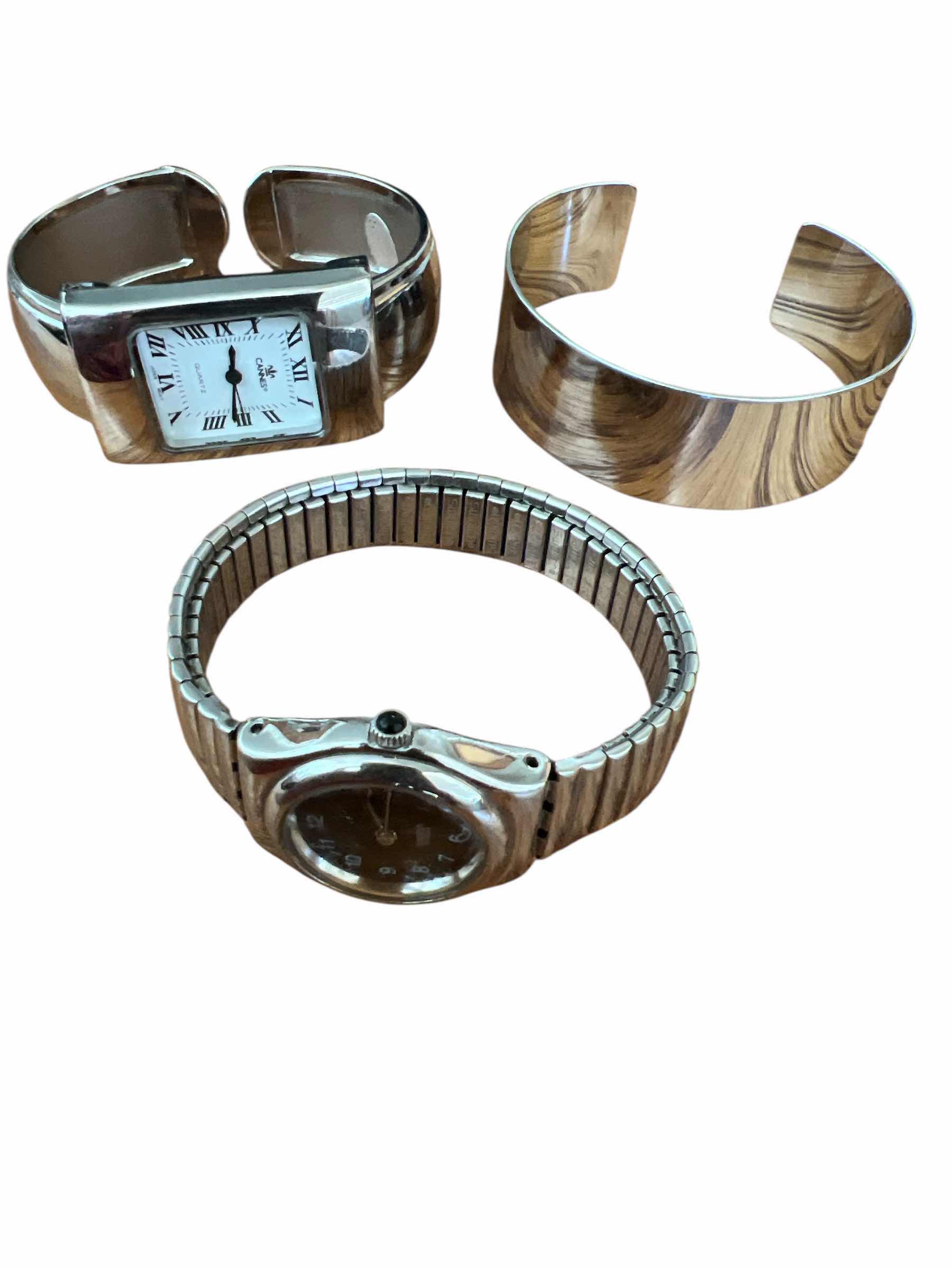 Photo 1 of 2 - WOMAN’S - SWATCH WATCH AND CANNES CUFF WATCH PLUS FRAM CUFF BRACELET
