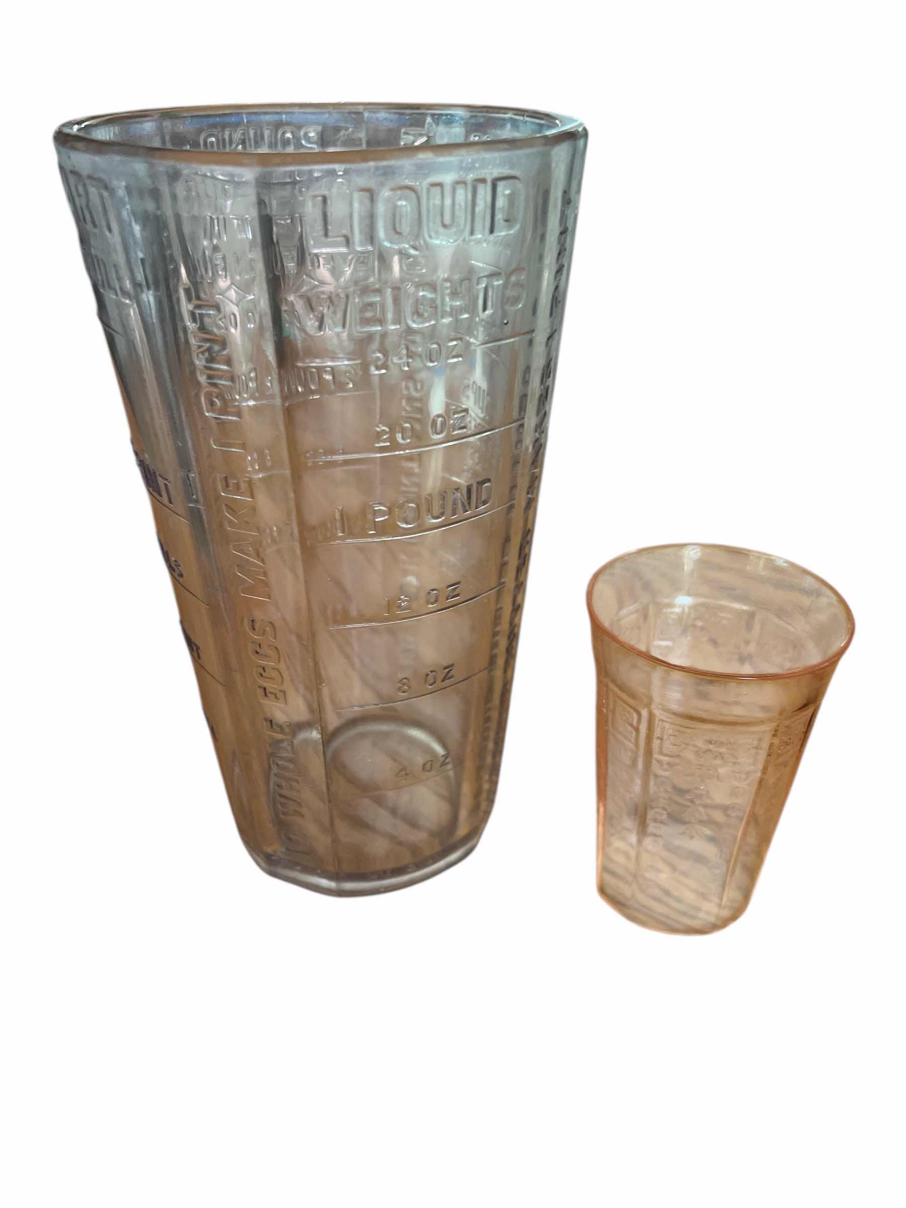 Photo 1 of “SILVER AND CO” GLASS MEASURING JAR - 7 1/2” AND PINK DEPRESSION GLASS JUICE GLASS