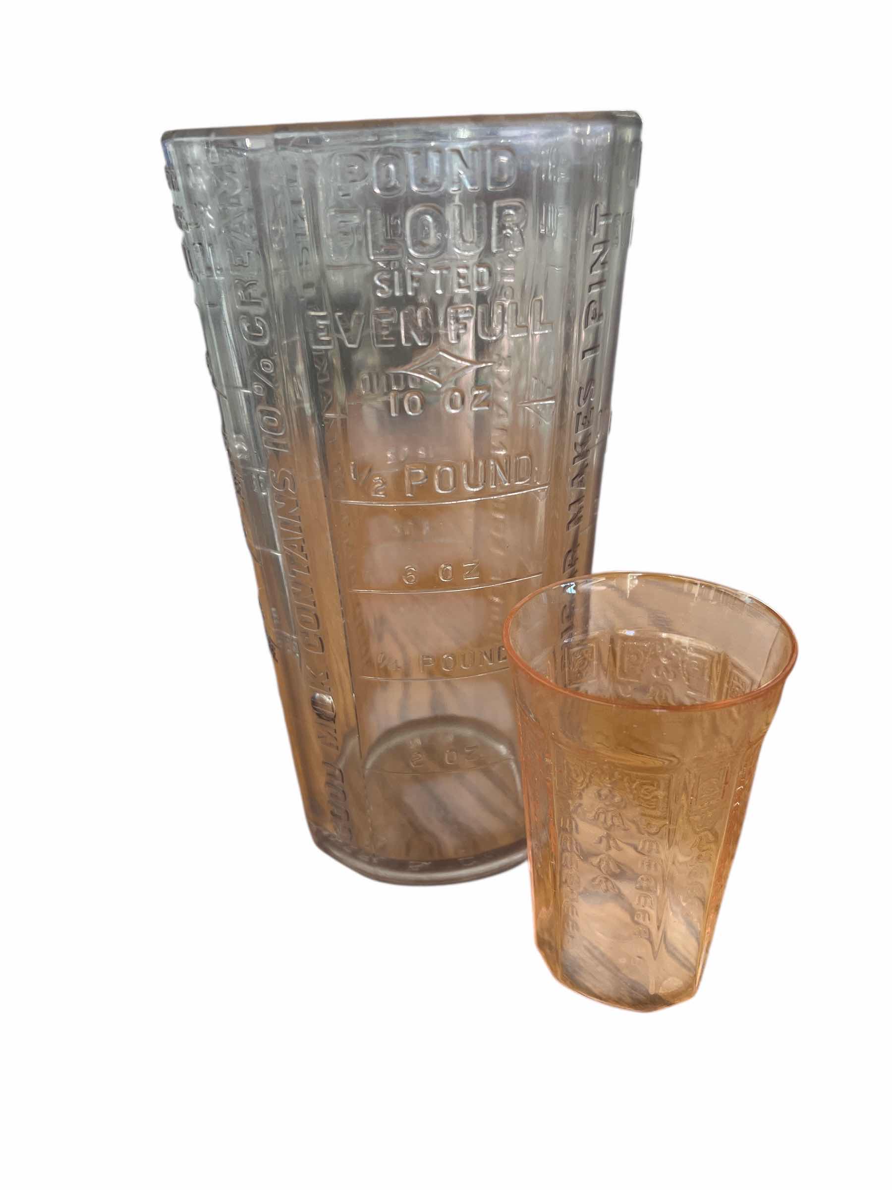 Photo 1 of “SILVER AND CO” GLASS MEASURING JAR - 7 1/2” AND PINK DEPRESSION GLASS JUICE GLASS
