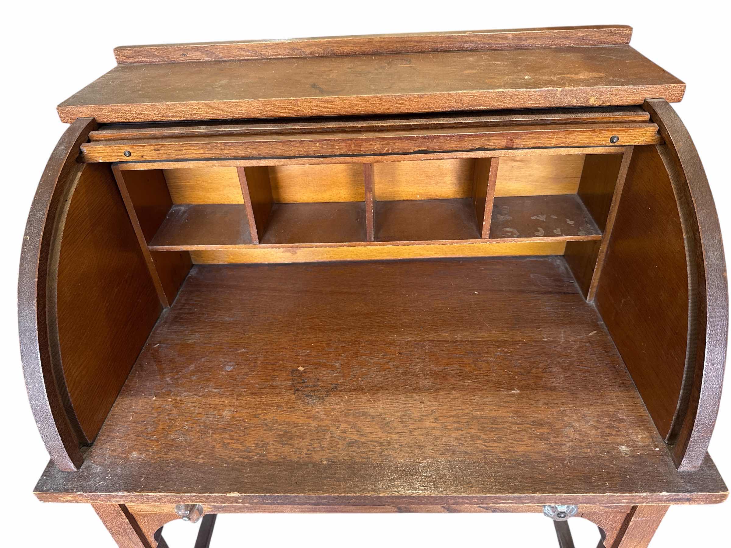 Photo 1 of 100
ANTIQUE CHILDS ROLL TOP DESK (STUCK IN OPEN POSITION)