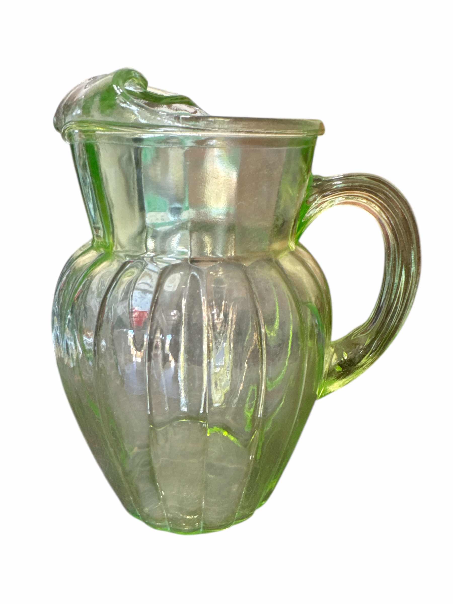 Photo 1 of 50
ANCHOR HOCKING PILLAR OPTIC URANIUM GLASS PITCHER