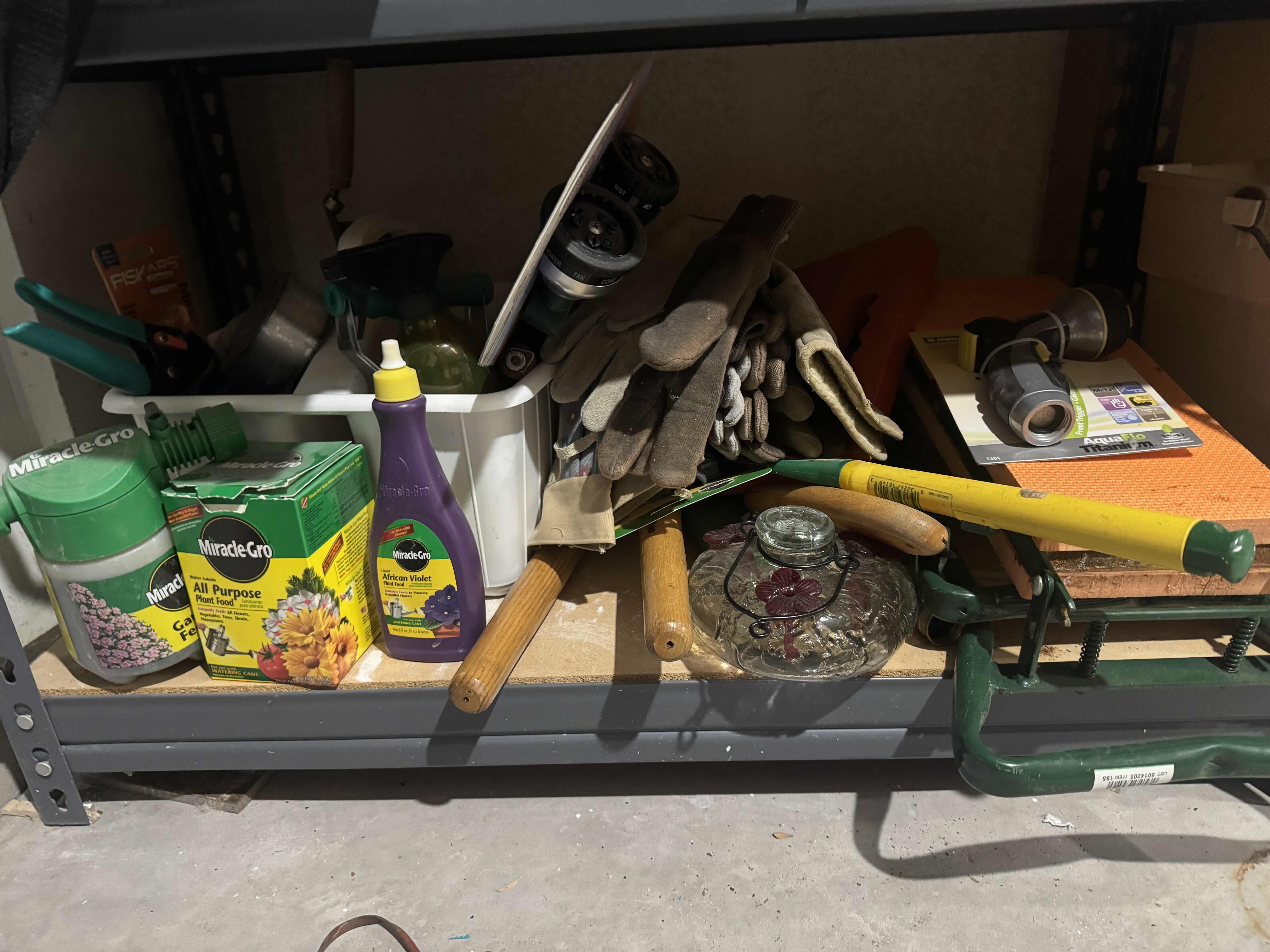 Photo 1 of 2 SHELVES OF GARDENING SUPPLIES