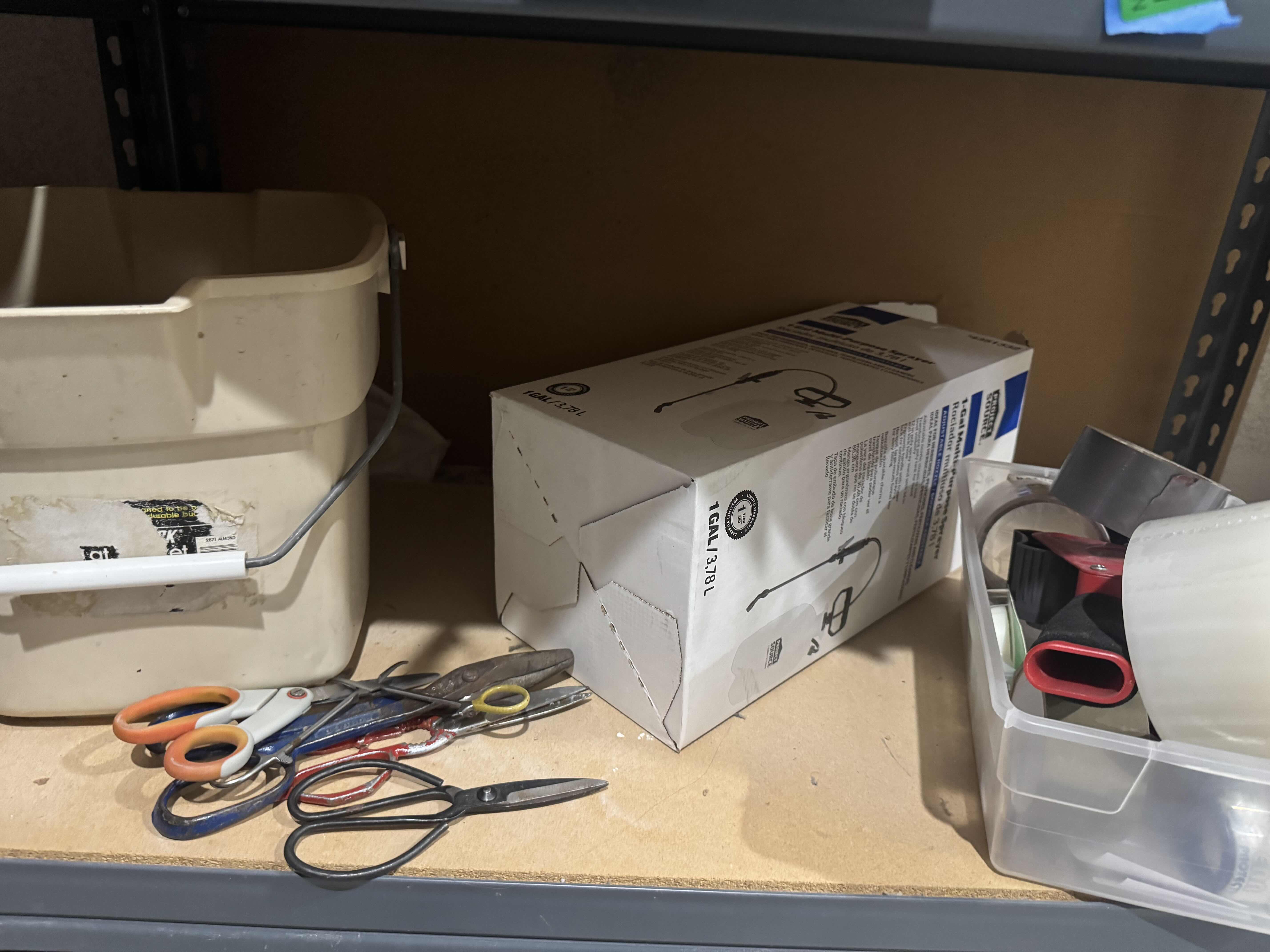 Photo 1 of 2 SHELVES OF GARDENING SUPPLIES