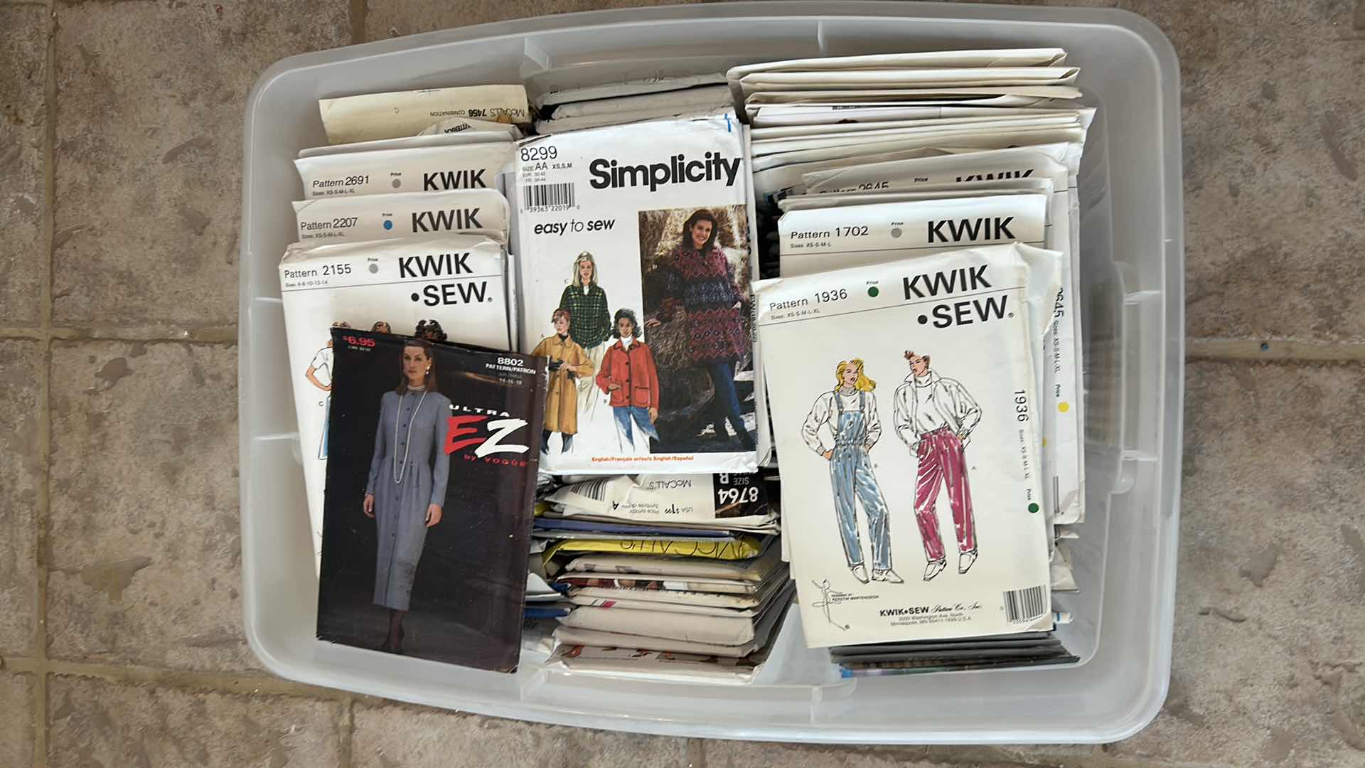 Photo 1 of CONTENTS OF TOTE ASSORTED SEWING PATERNS