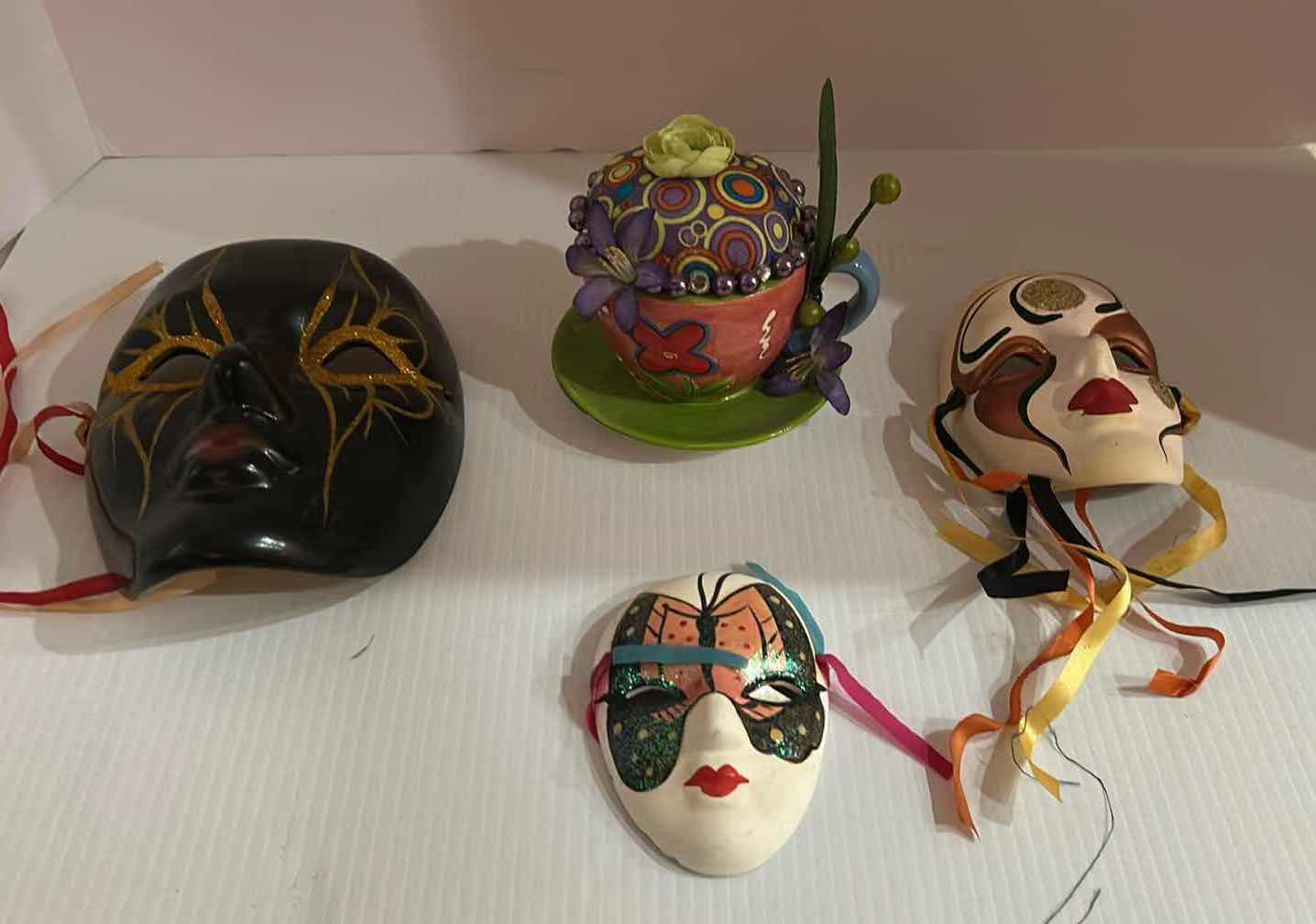 Photo 1 of 3- DECORATIVE MASKS AND TEA CUP