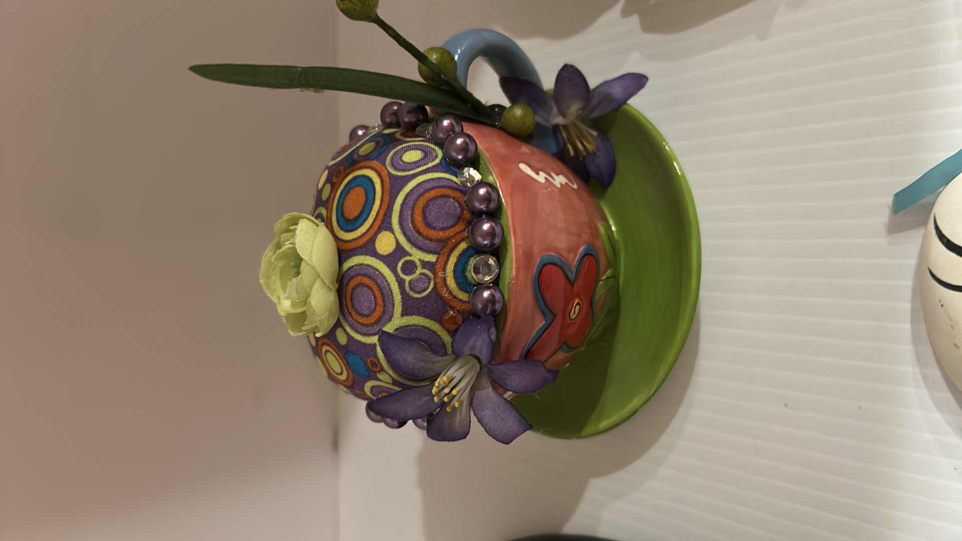 Photo 1 of 3- DECORATIVE MASKS AND TEA CUP