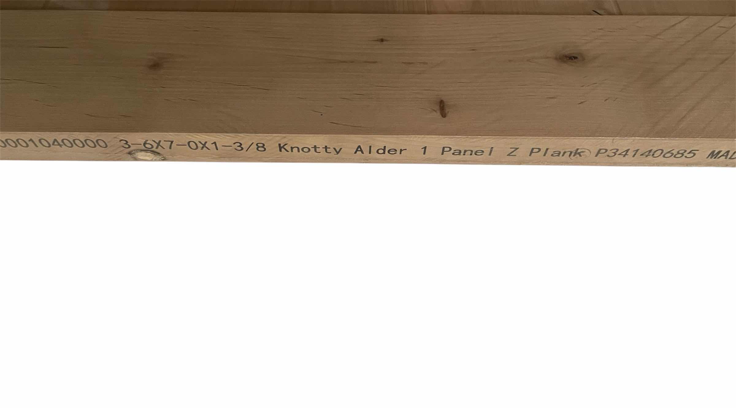 Photo 1 of NEW MASONITE Z-BAR KNOTTY ALDER WOOD INTERIOR BARN DOOR 42” X 84” (BARN DOOR ONLY)