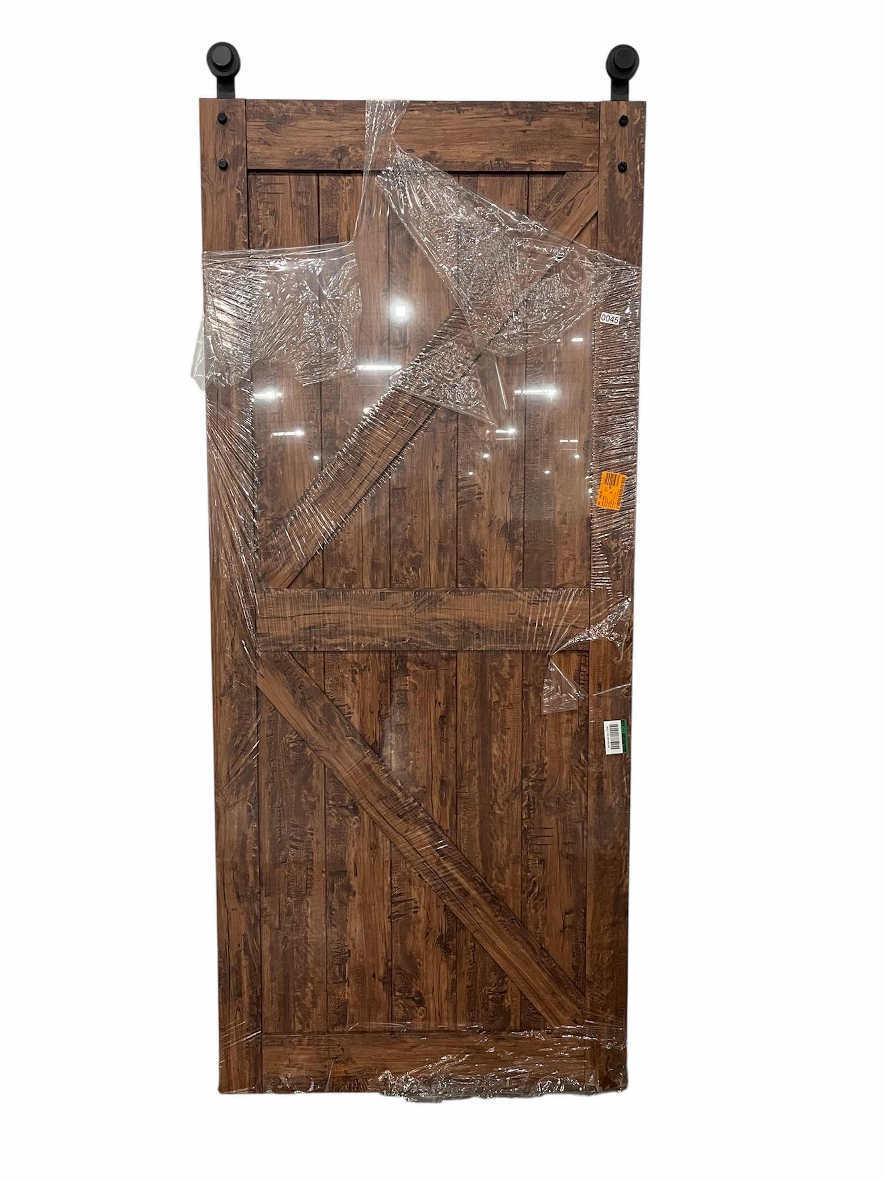 Photo 1 of MASONITE K-BAR AUBURN WOOD INTERIOR BARN DOOR 36” X 84” (DOOR ONLY)