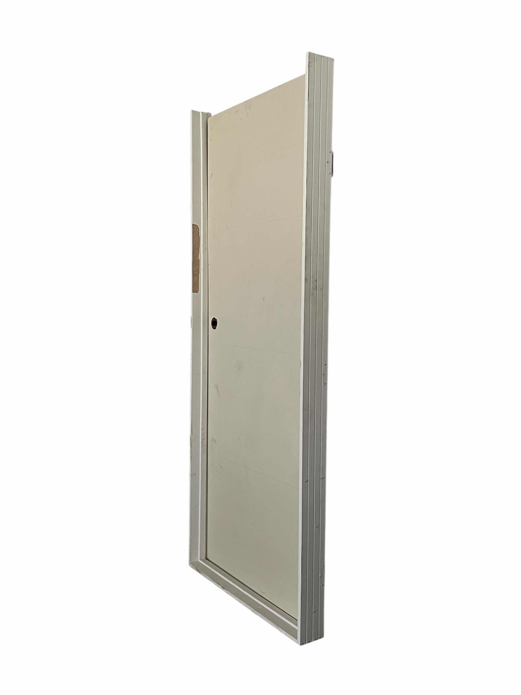 Photo 1 of WHITE FINISH 4-PANEL SOLID CORE RIGHT-HANDED PREHUNG INTERIOR DOOR W FRAME (DOOR 32” X 1.3/8 H80” FRAME 33.25” X 4.5” H81”