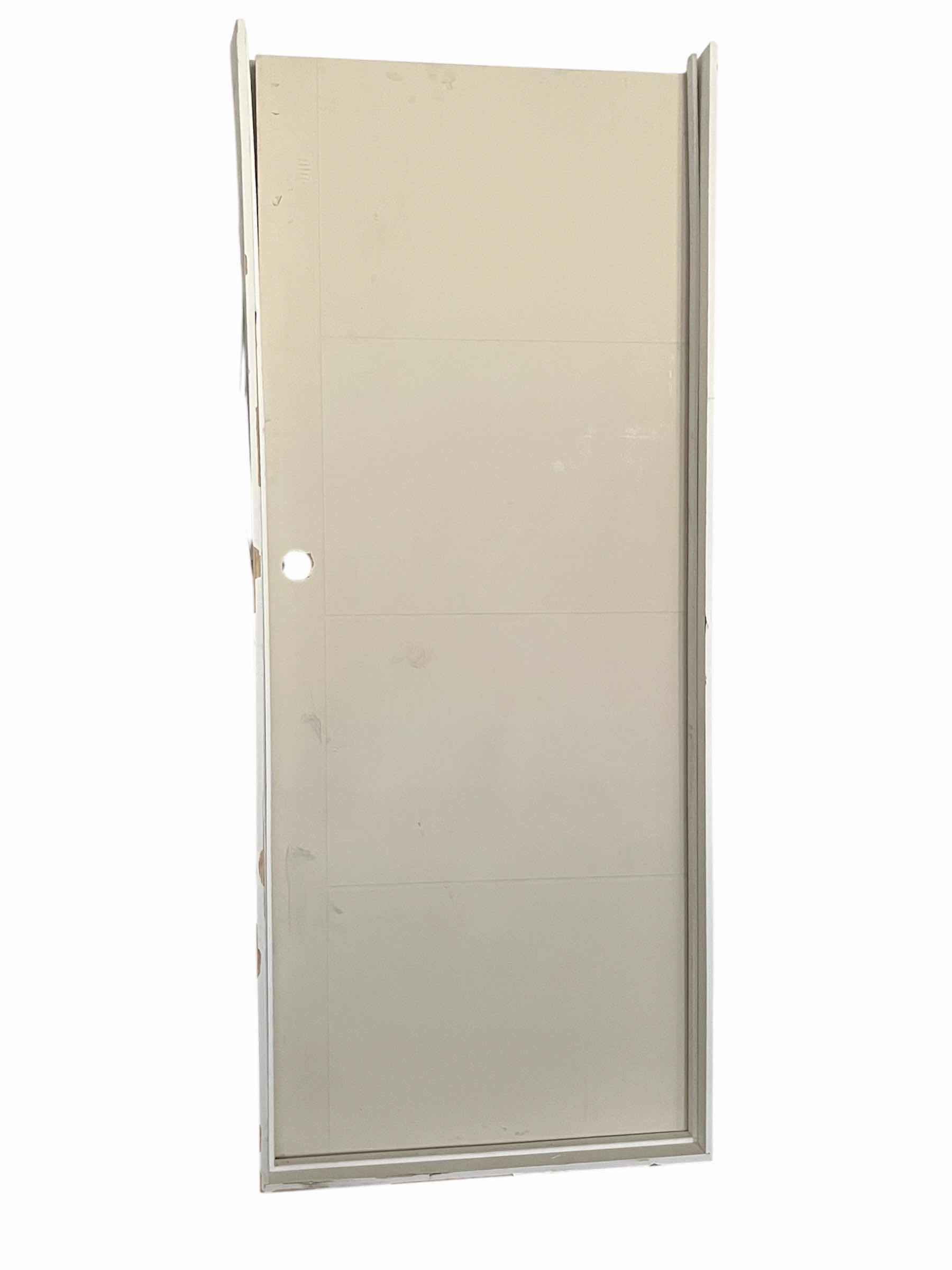 Photo 1 of WHITE FINISH 4-PANEL SOLID CORE RIGHT-HANDED PREHUNG INTERIOR DOOR W FRAME (DOOR 32” X 1.3/8 H80” FRAME 33.25” X 4.5” H81”
