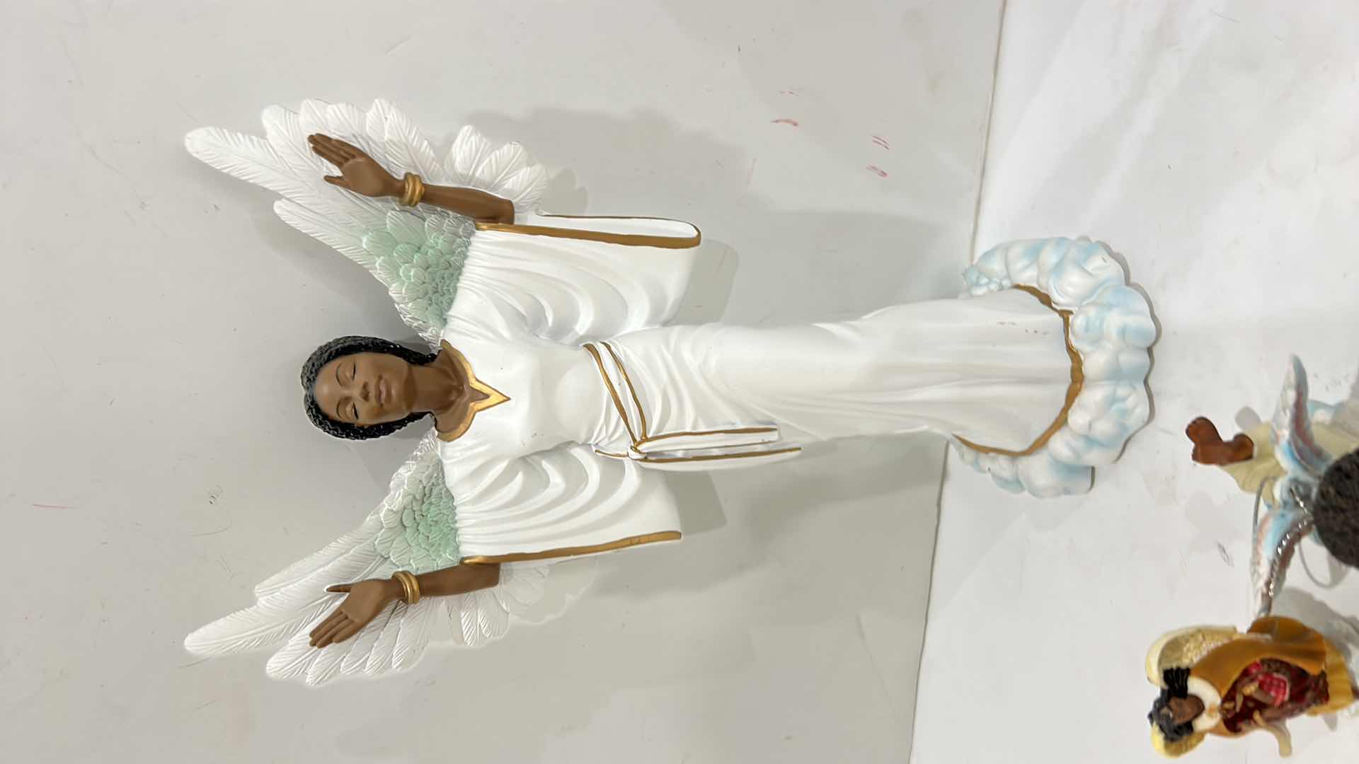 Photo 1 of ANGEL FIGURINE ASSORTMENT TALLEST 12”