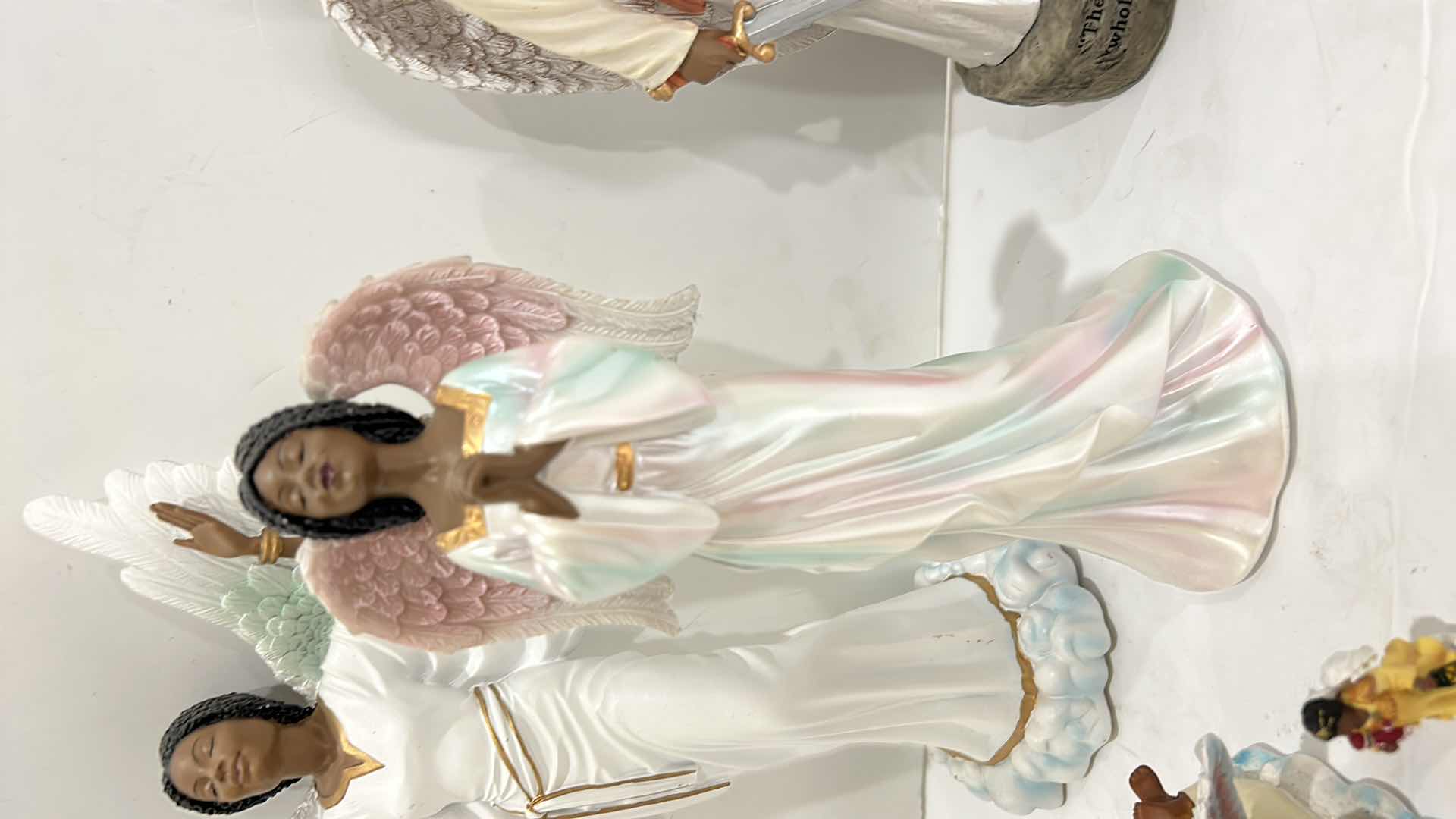 Photo 1 of ANGEL FIGURINE ASSORTMENT TALLEST 12”