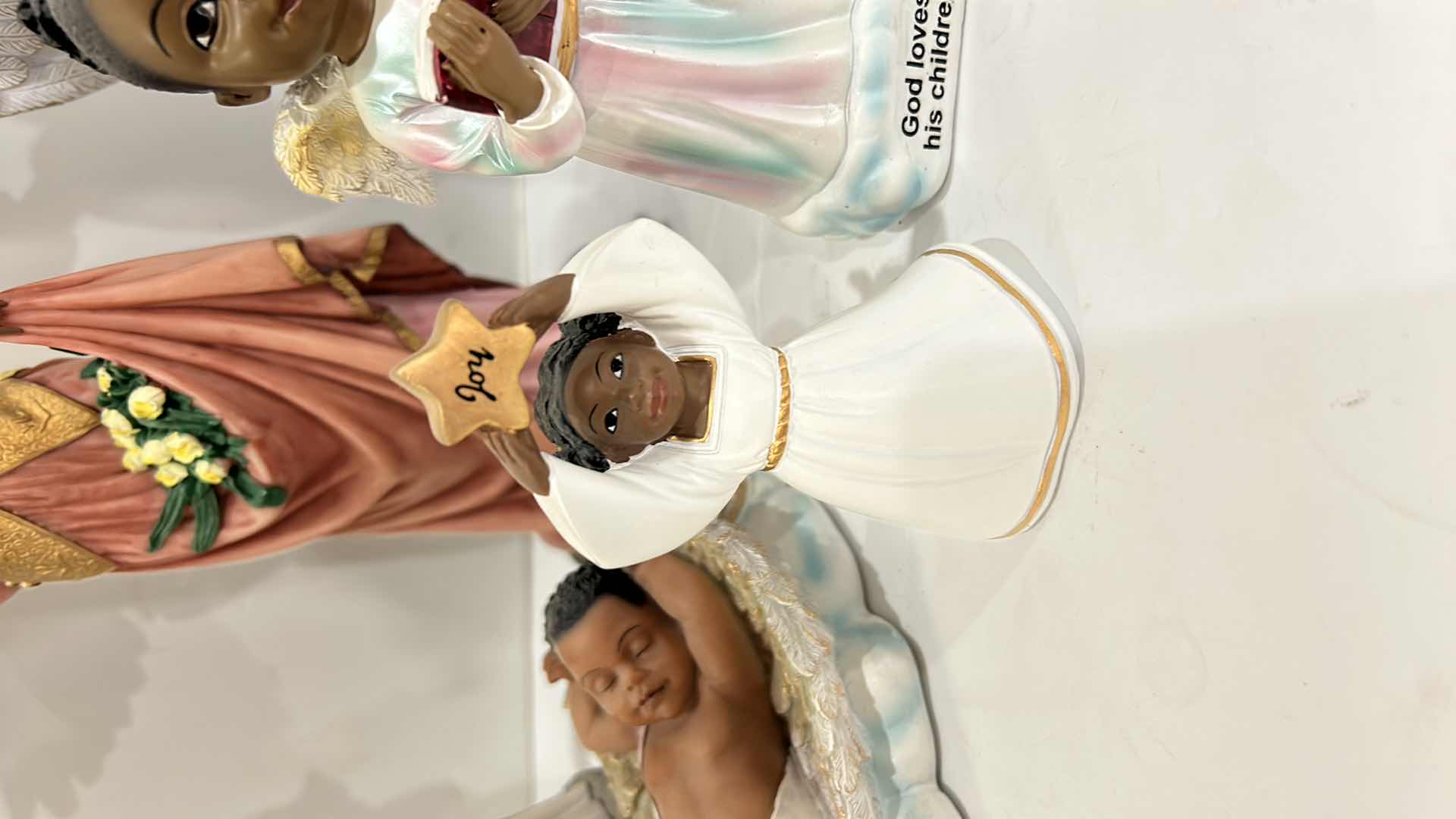 Photo 1 of ANGEL FIGURINE ASSORTMENT TALLEST 12”