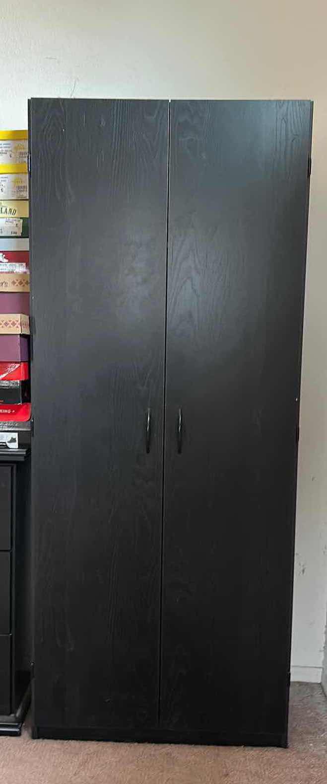 Photo 1 of STORAGE CABINET COLOR BLACK OAK 30” x 17” x 71”