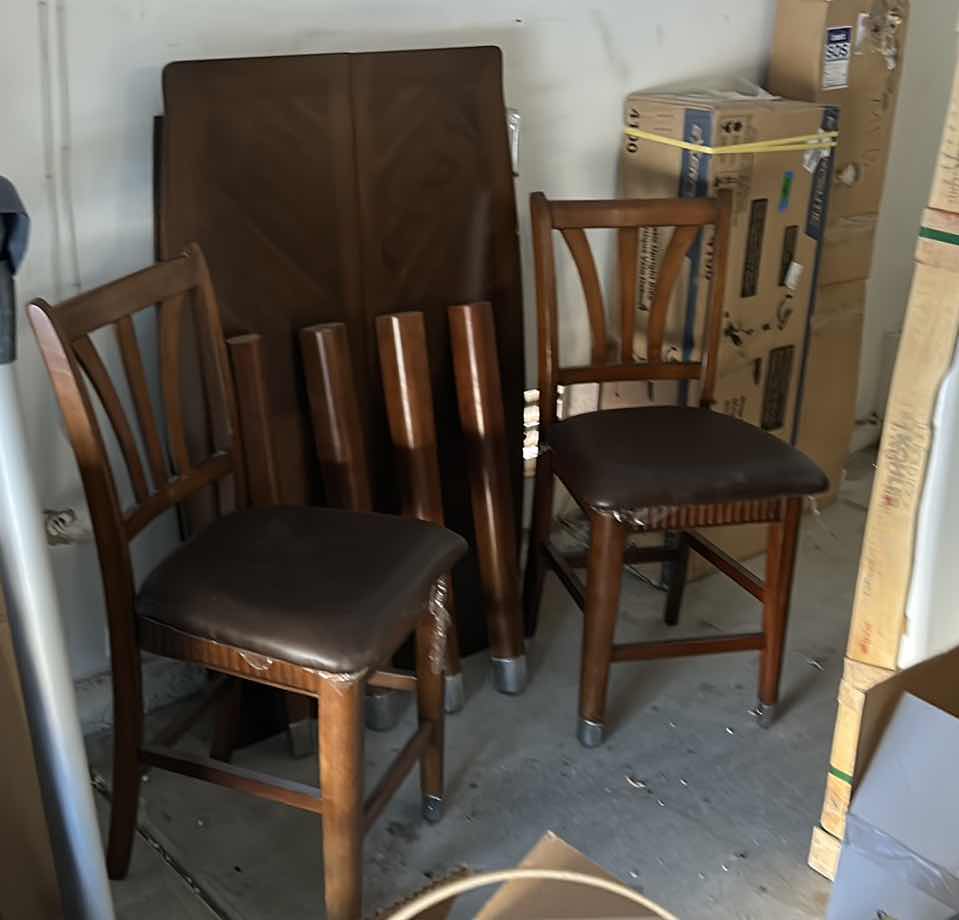 Photo 1 of ASHLEY FURNITURE WOOD BUTTERFLY LEAF DINING ROOM SET  TABLE AND 4 CHAIRS 37” x 56”