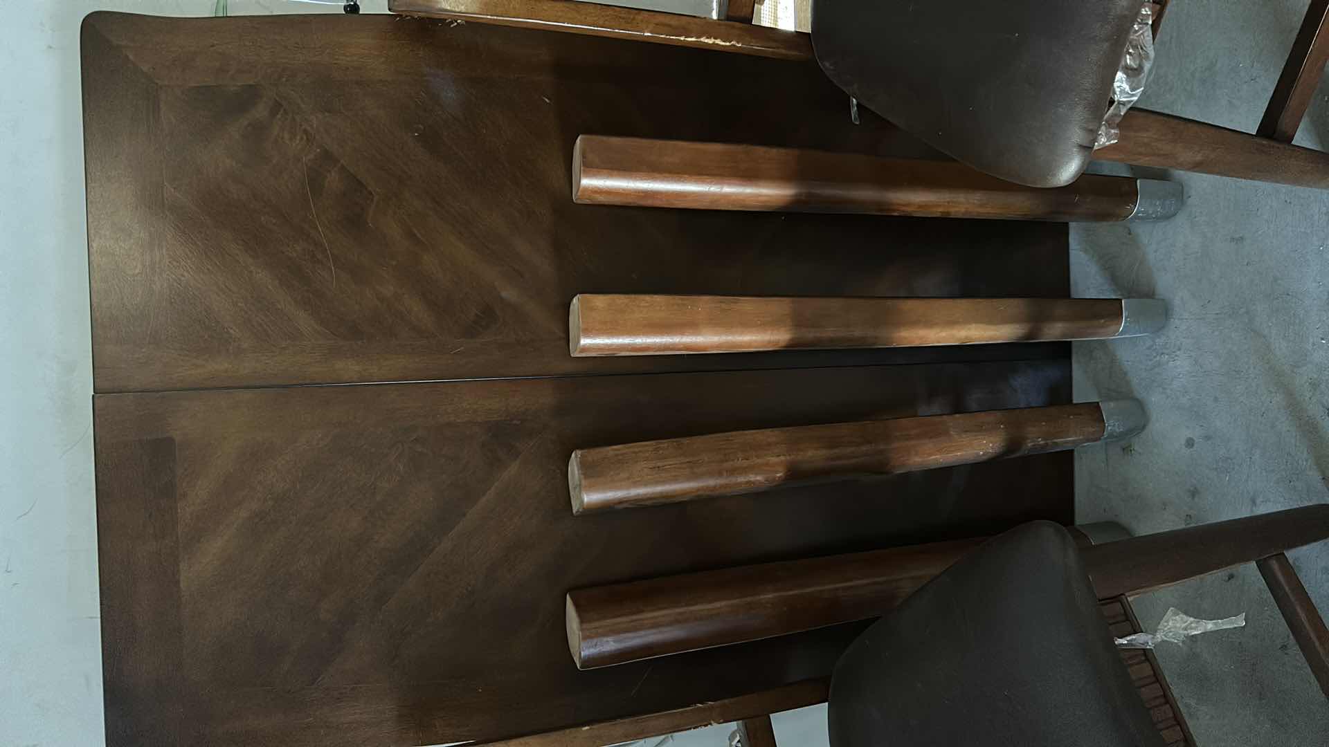 Photo 1 of ASHLEY FURNITURE WOOD BUTTERFLY LEAF DINING ROOM SET  TABLE AND 4 CHAIRS 37” x 56”