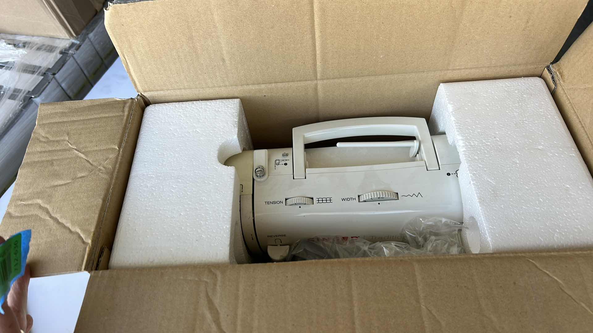 Photo 1 of NEW SINGER SEWING MACHINE