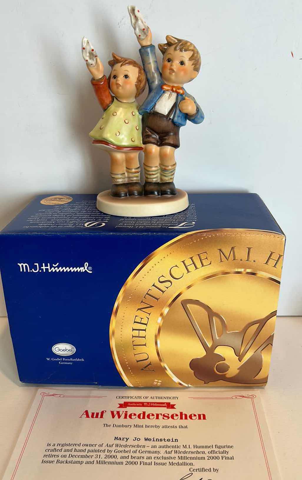 View 1 of M. J HÛMMEL WITH COA RETIRED IN 2000 AUF WIEDERSEHEN HANDPAINTED FIGURINE H5.5”