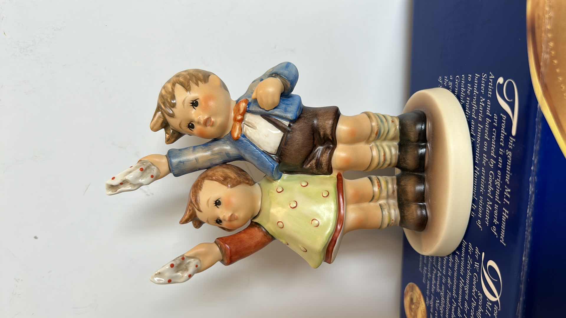 View 2 of M. J HÛMMEL WITH COA RETIRED IN 2000 AUF WIEDERSEHEN HANDPAINTED FIGURINE H5.5”