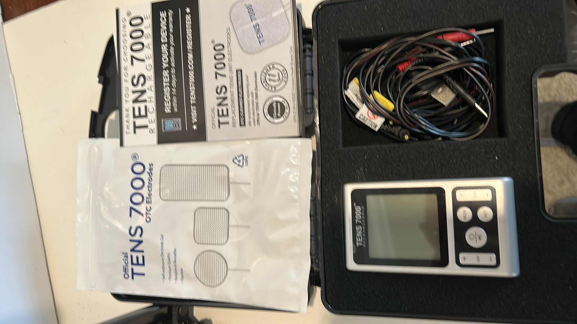 Photo 1 of MEDICAL SUPPLIES- ROLLING IV STAND & TENS 7000