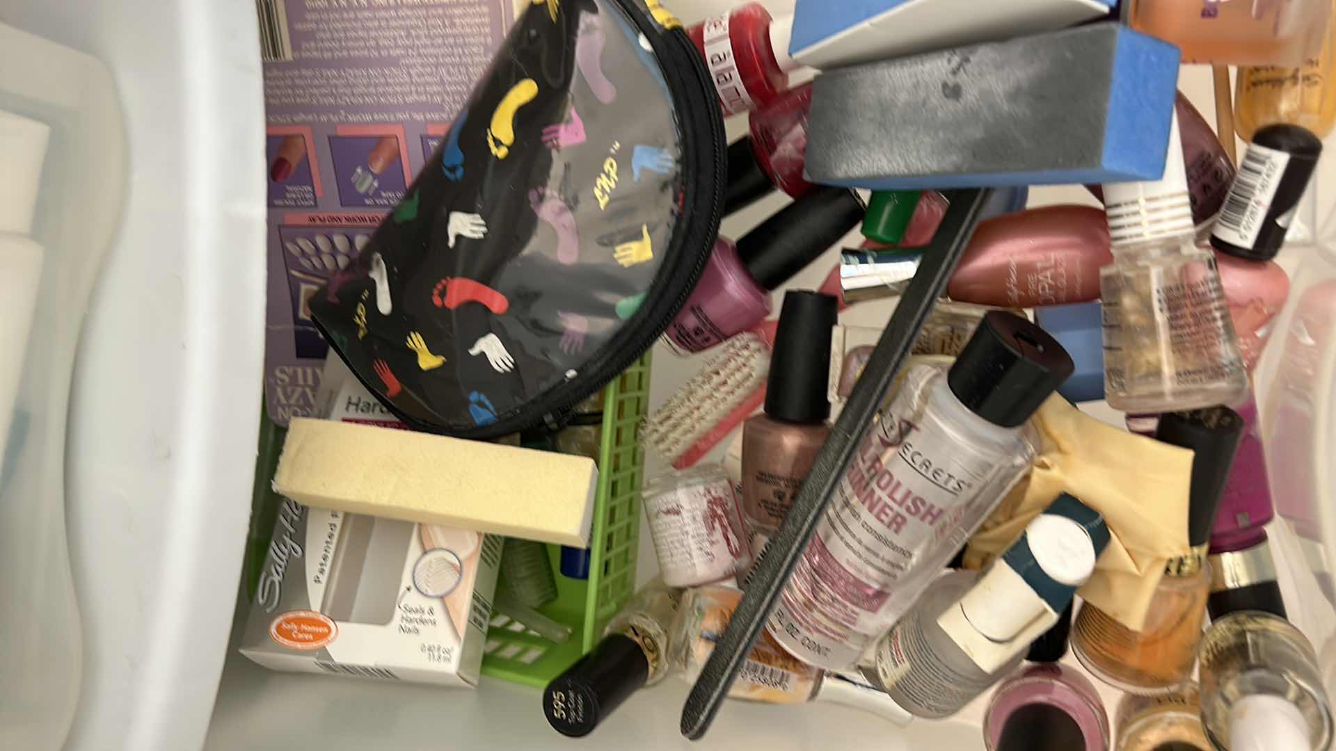 Photo 1 of CONTENTS OF BATHROOM CABINET