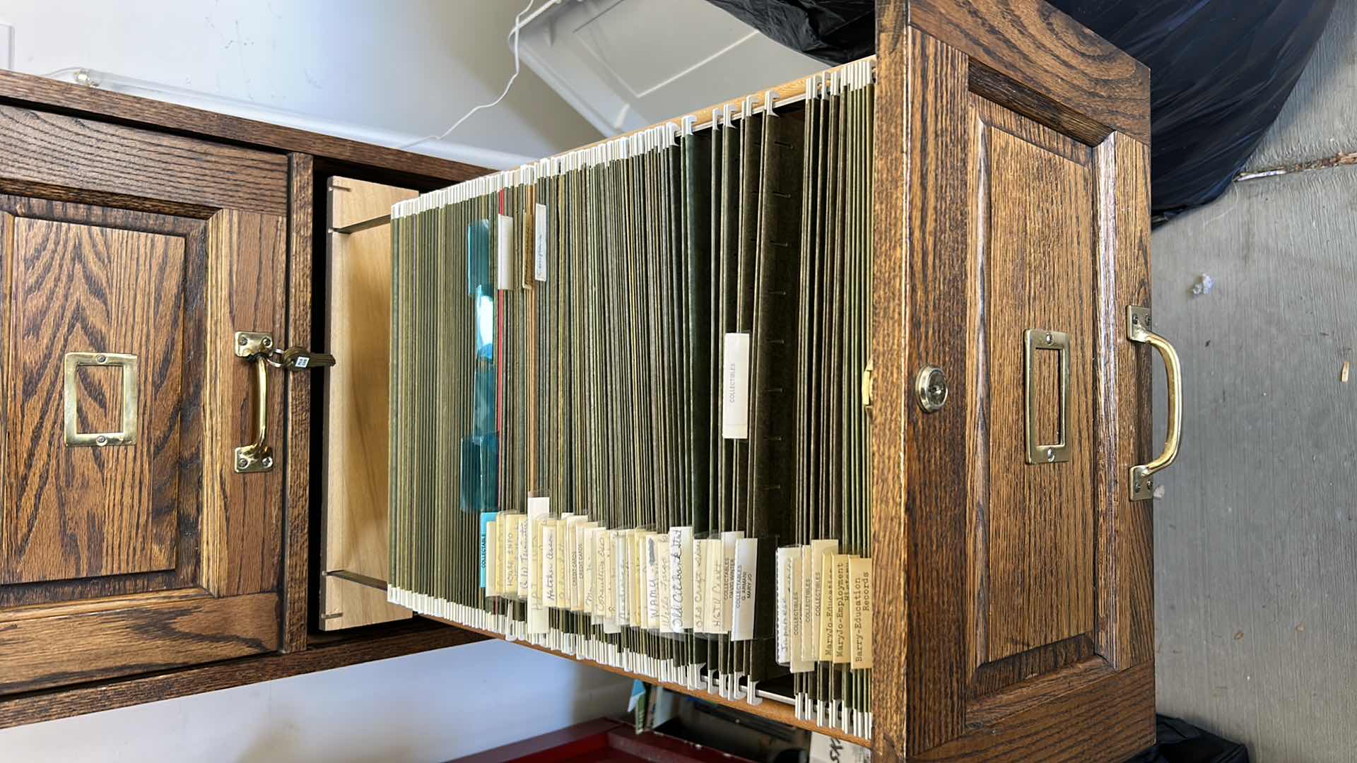 Photo 1 of LOCKING WOOD FILE CABINET WITY KEYS 90” x 28” x 53 1/2”