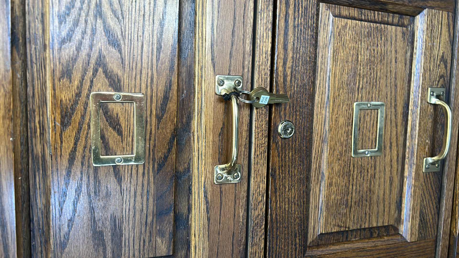 Photo 1 of LOCKING WOOD FILE CABINET WITY KEYS 90” x 28” x 53 1/2”