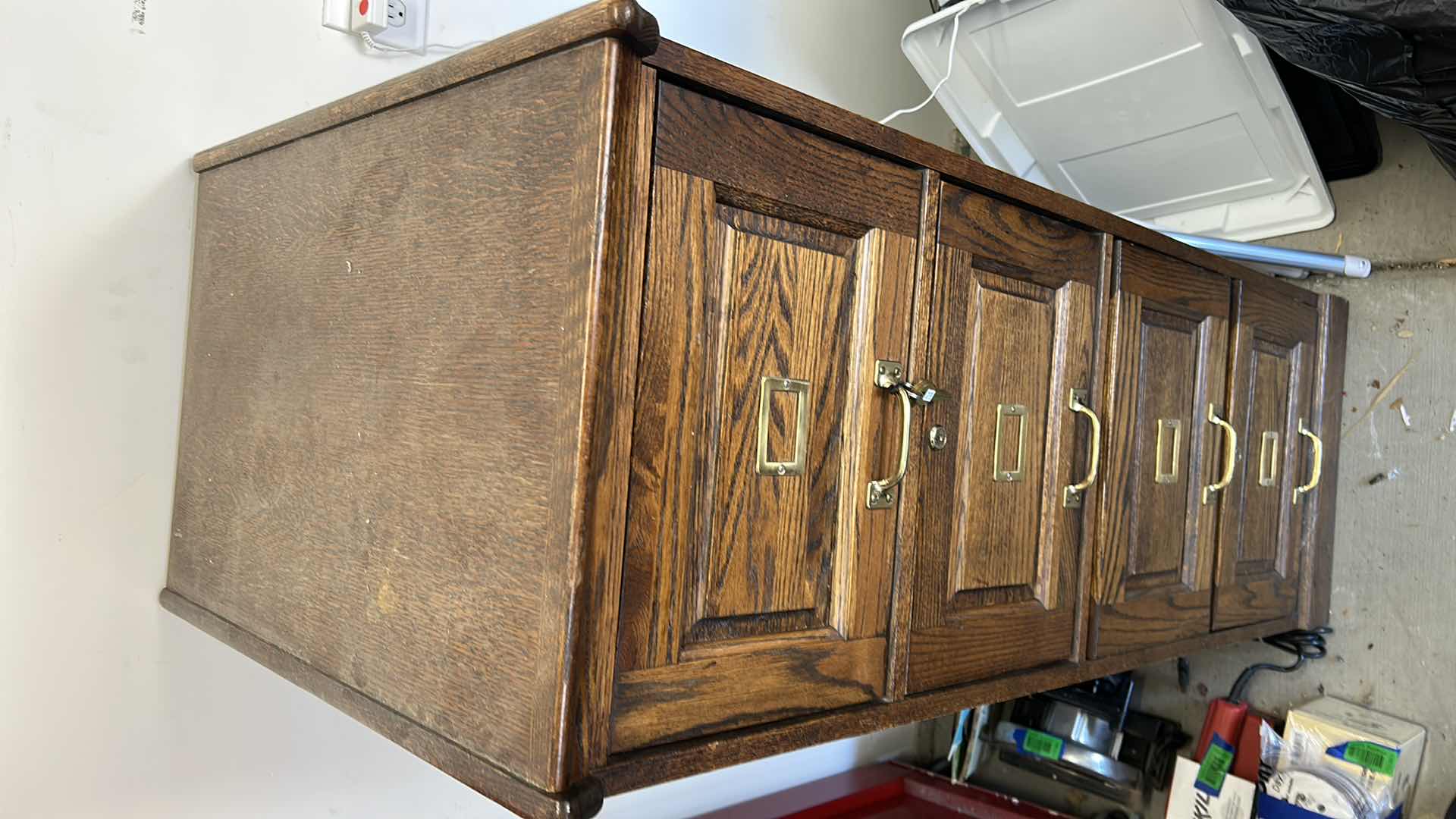 Photo 1 of LOCKING WOOD FILE CABINET WITY KEYS 90” x 28” x 53 1/2”