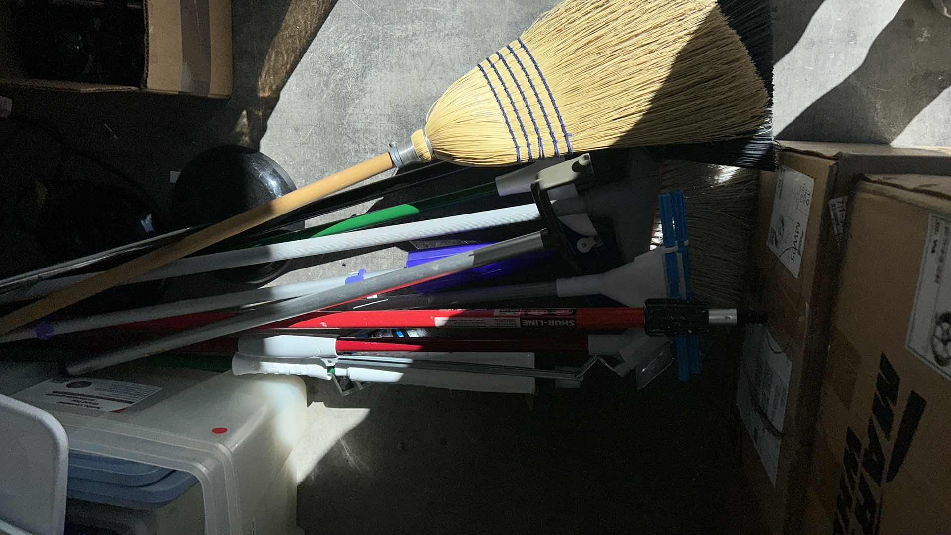 Photo 1 of BROOMS AND MOPS