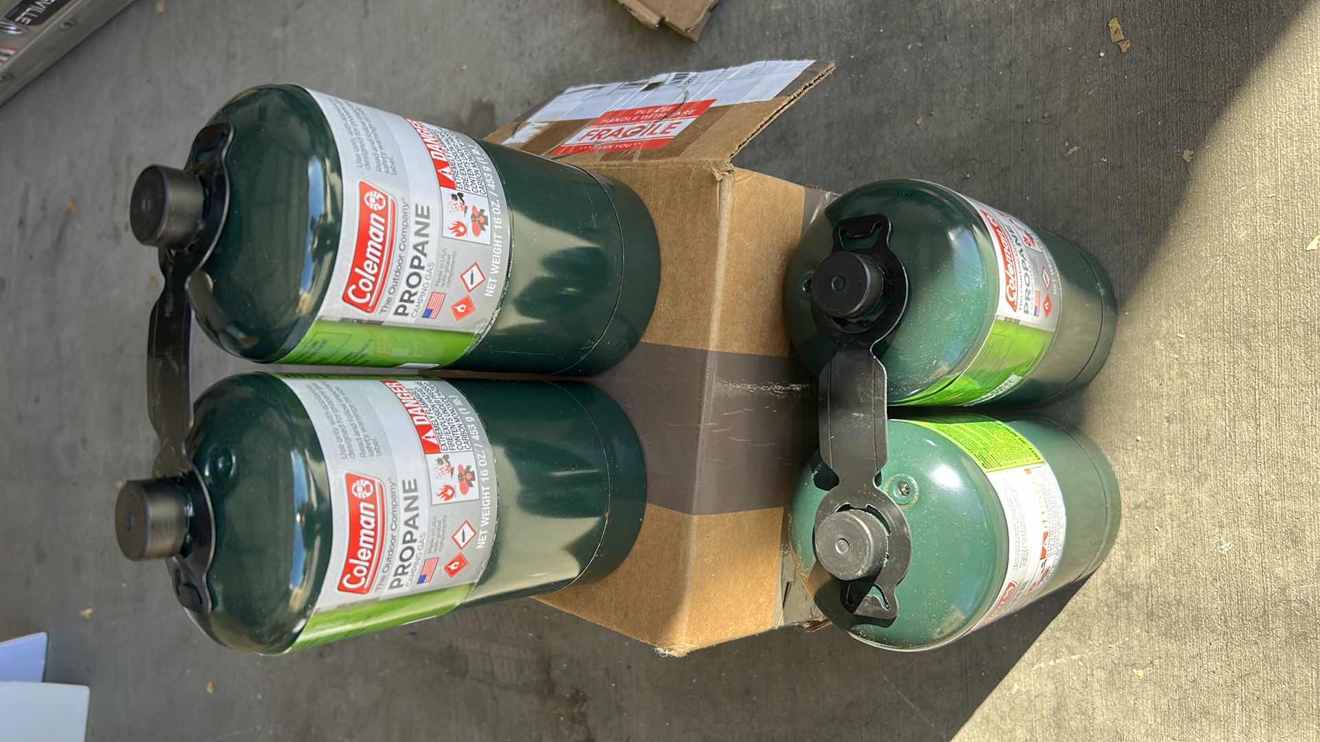 Photo 1 of 4 COLEMAN PROPANE TANKS