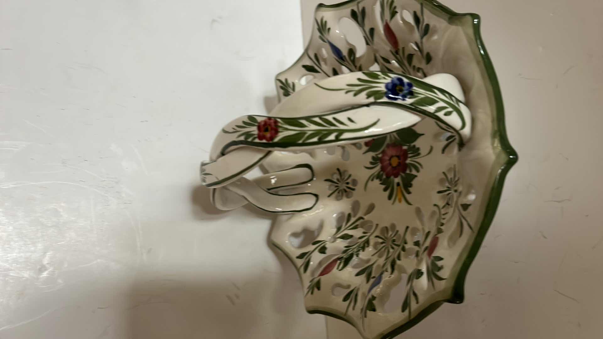 Photo 1 of SIGNED NUMBERED PORCELAIN HAND PAINTED BASKET MADE IN PORTUGAL 
11” x 6”