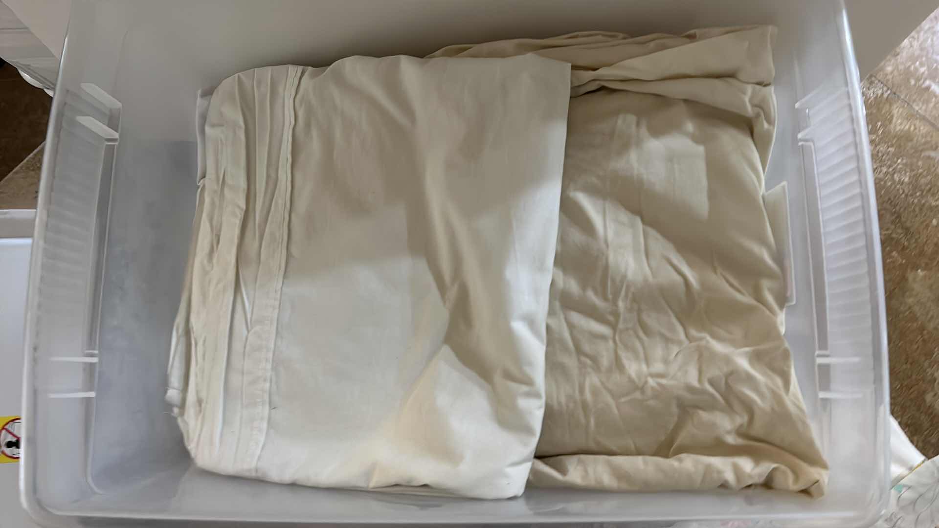 Photo 1 of TOTE FULL OF LINENS