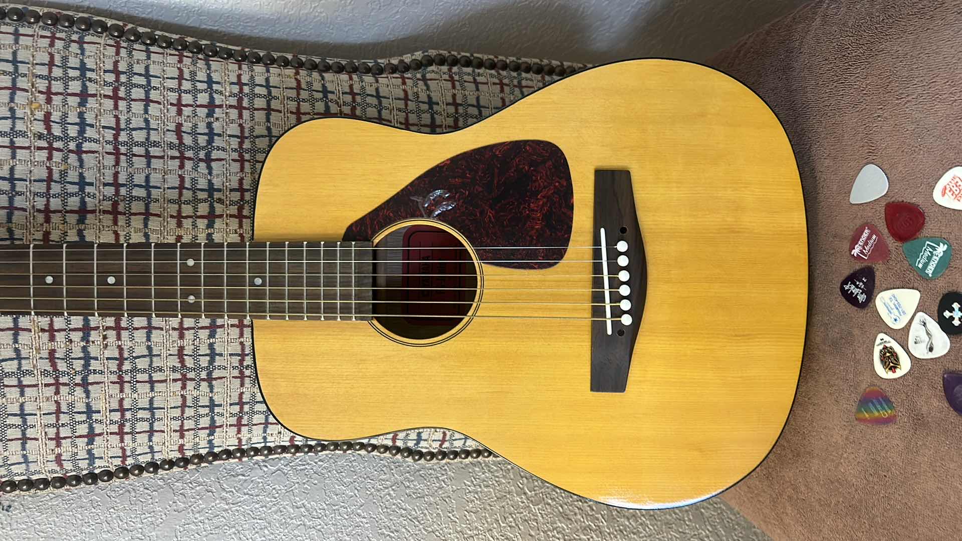 Photo 1 of CHILD SIZE YAMAHA GUITAR, BOOK, GIG BAG AND PICKS