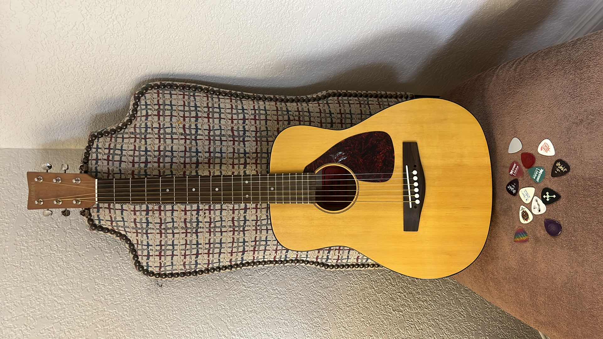 Photo 1 of CHILD SIZE YAMAHA GUITAR, BOOK, GIG BAG AND PICKS