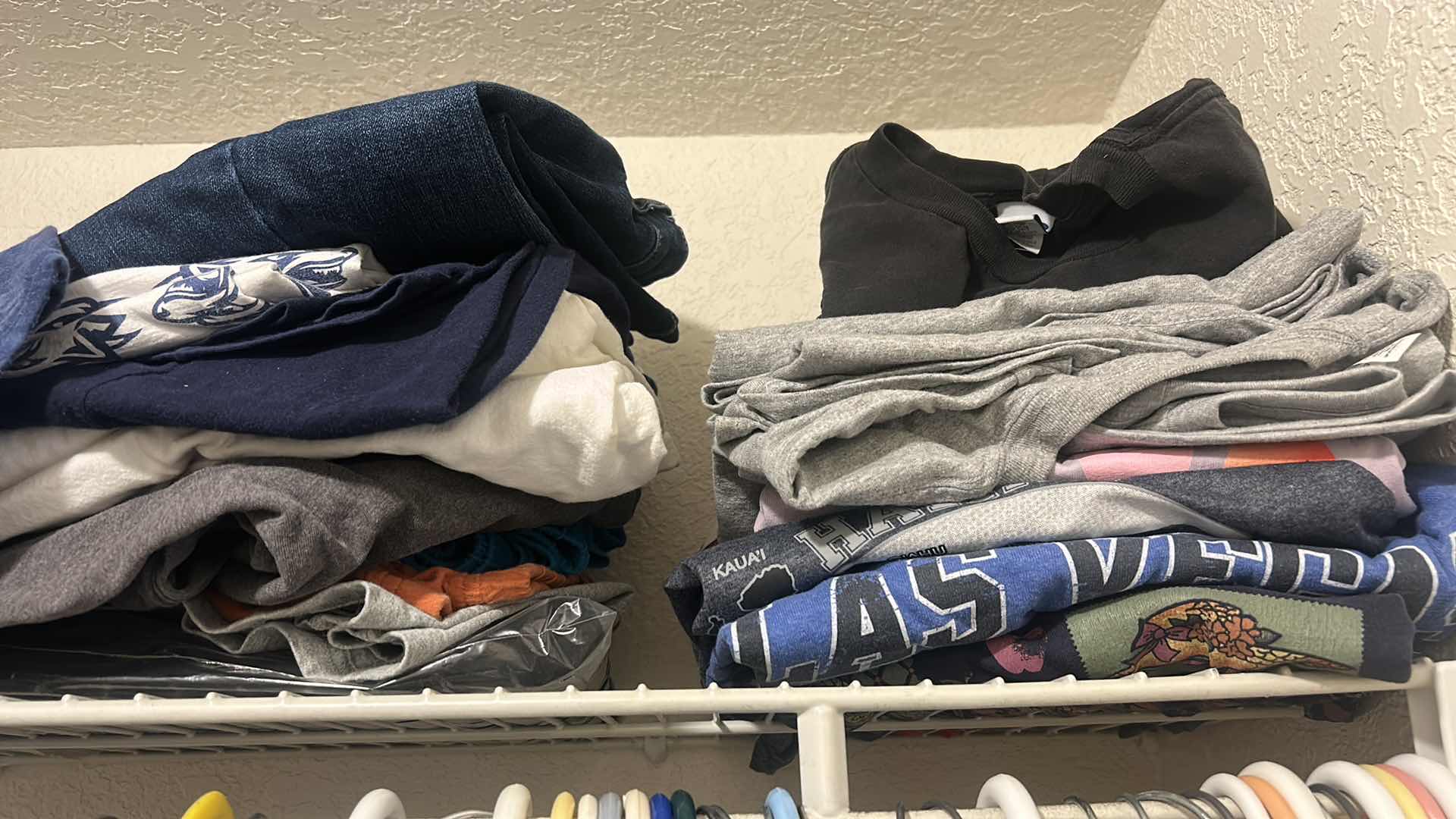 Photo 1 of CONTENTS RIGHT SIDE OF CLOSET- WOMEN AND MENS CLOTHING