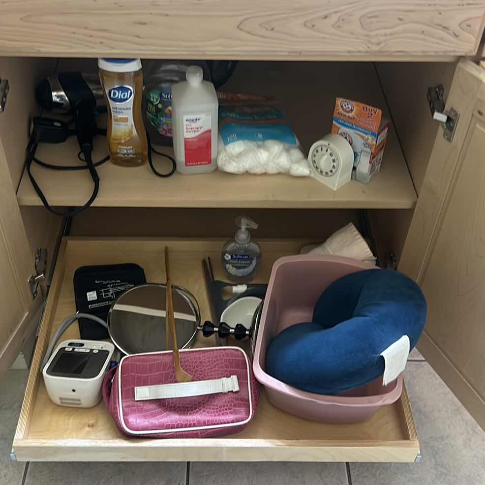 Photo 1 of CONTENTS OF CABINET- BATHROOM