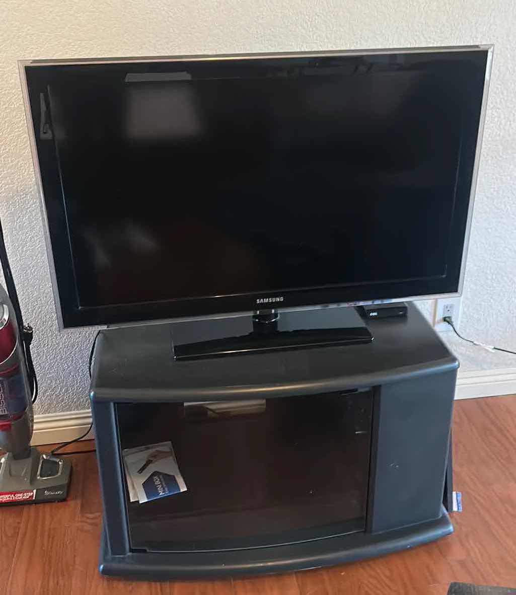Photo 1 of 44” SAMSUNG TV WITH CABINET AND MOVIES