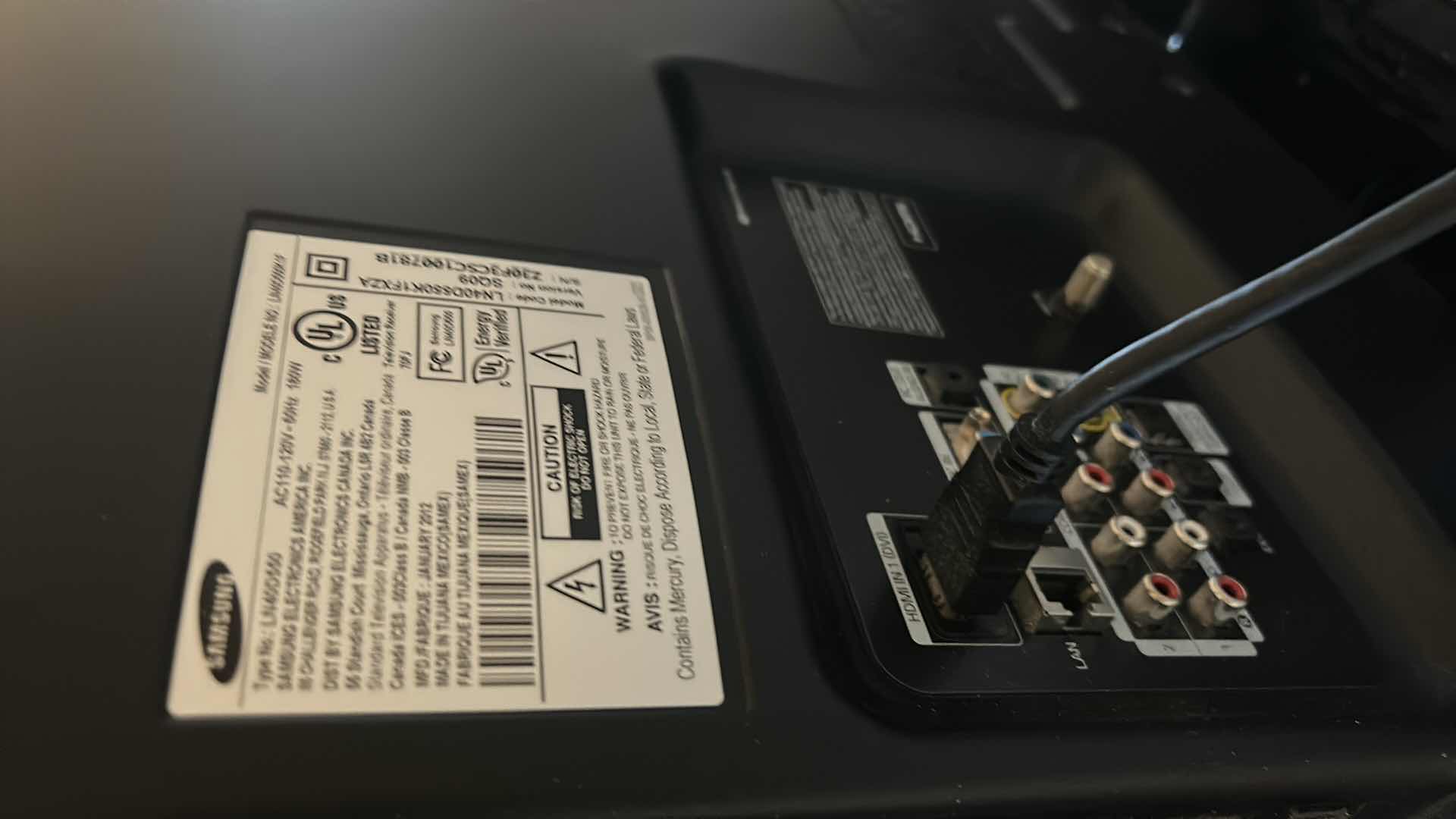 Photo 1 of 44” SAMSUNG TV WITH CABINET AND MOVIES