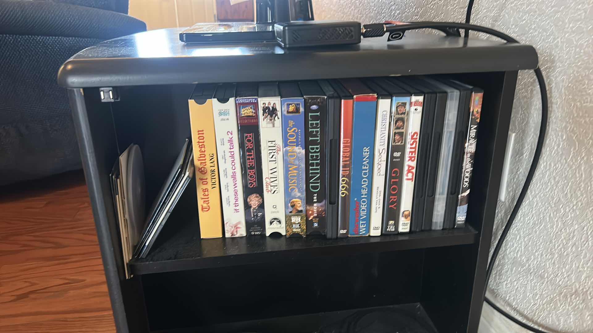 Photo 1 of 44” SAMSUNG TV WITH CABINET AND MOVIES