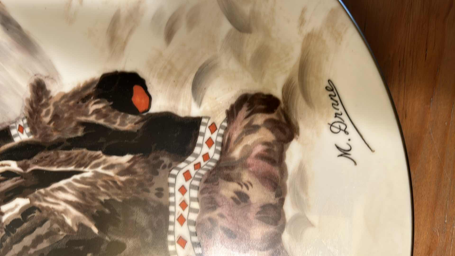 Photo 1 of 12” SIGNED PORCELAIN PLATE, ESKIMO CHILD, KODIAK ISLAND