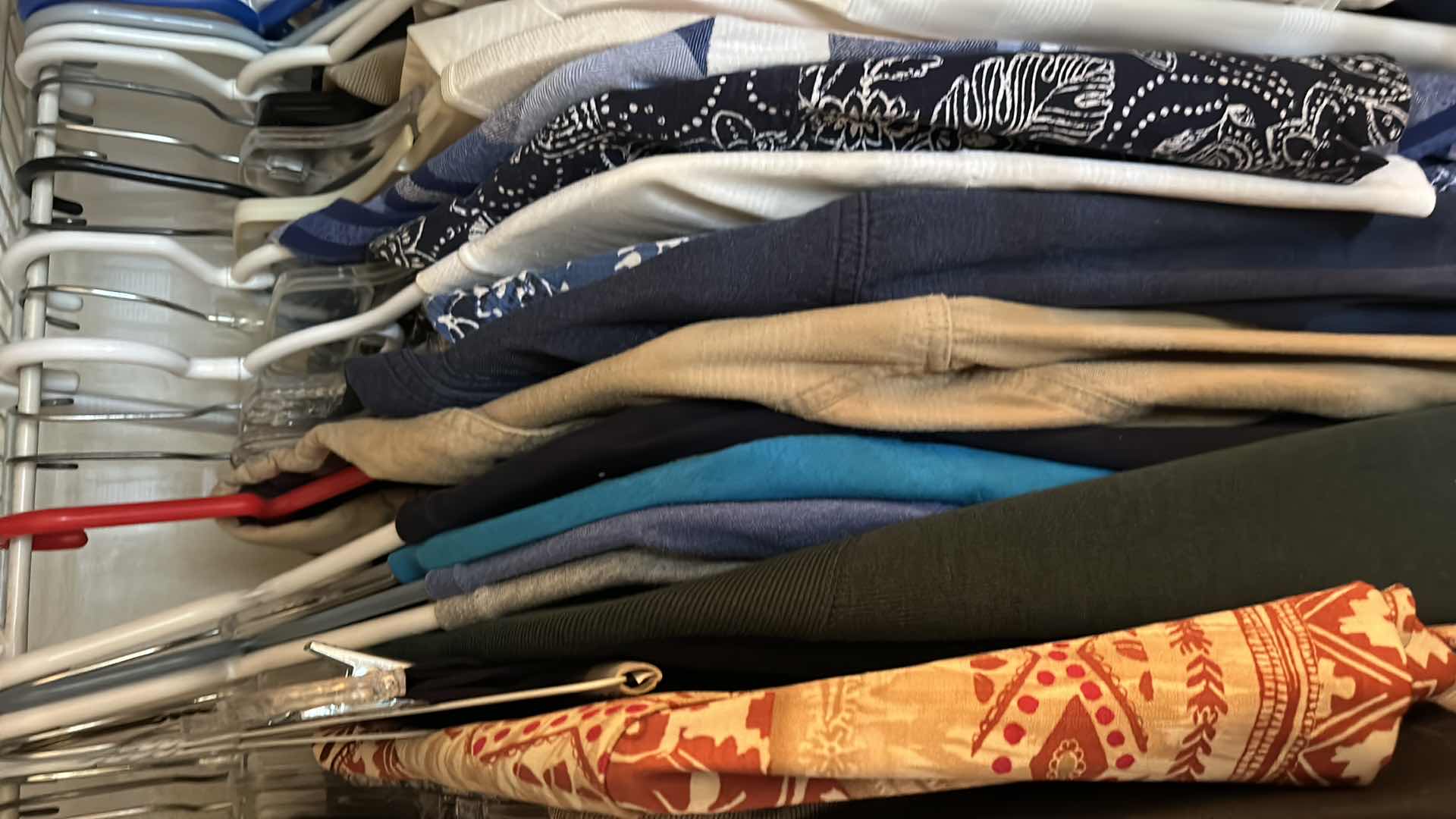 Photo 1 of MEN AND WOMENS CLOTHING ASSORTMENT