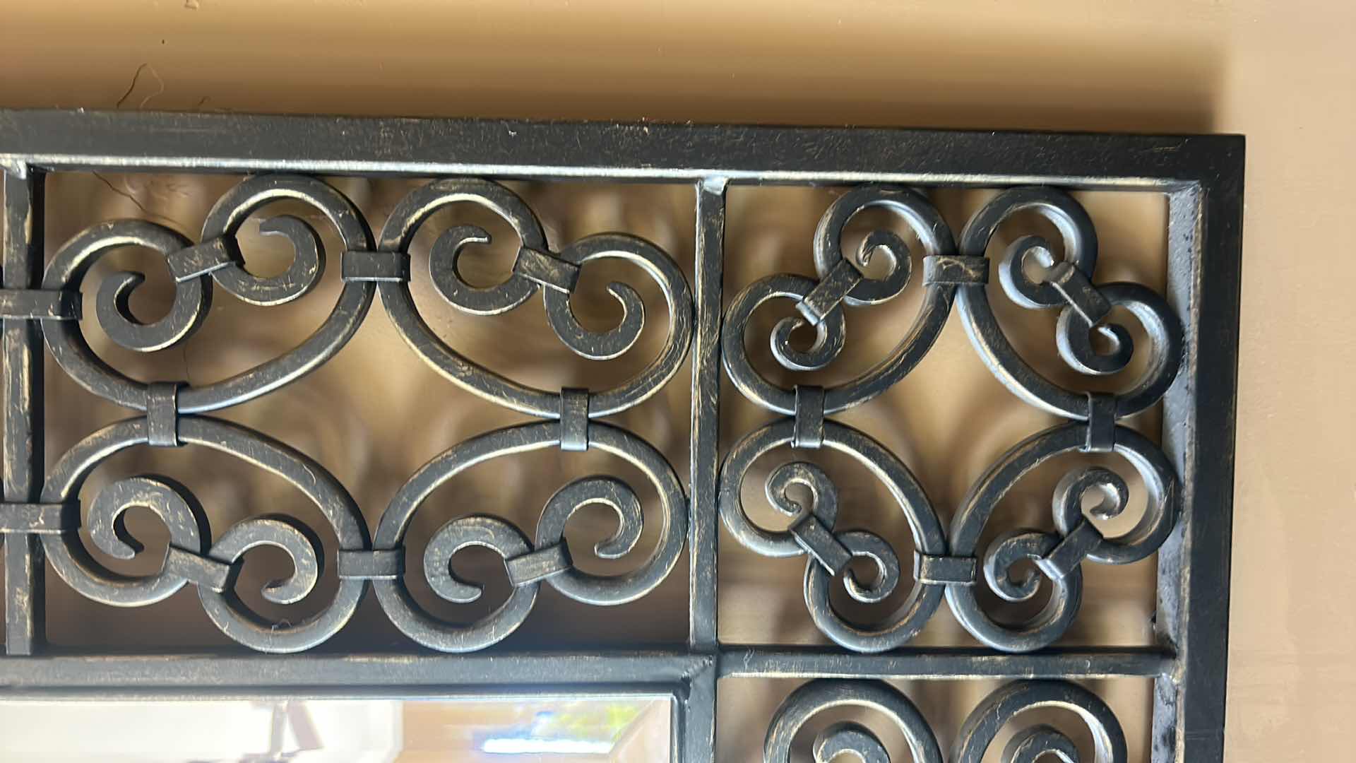 Photo 1 of HEAVY METAL SCROLL FRAMED BEVELED GLASS MIRROR 55” x 45”