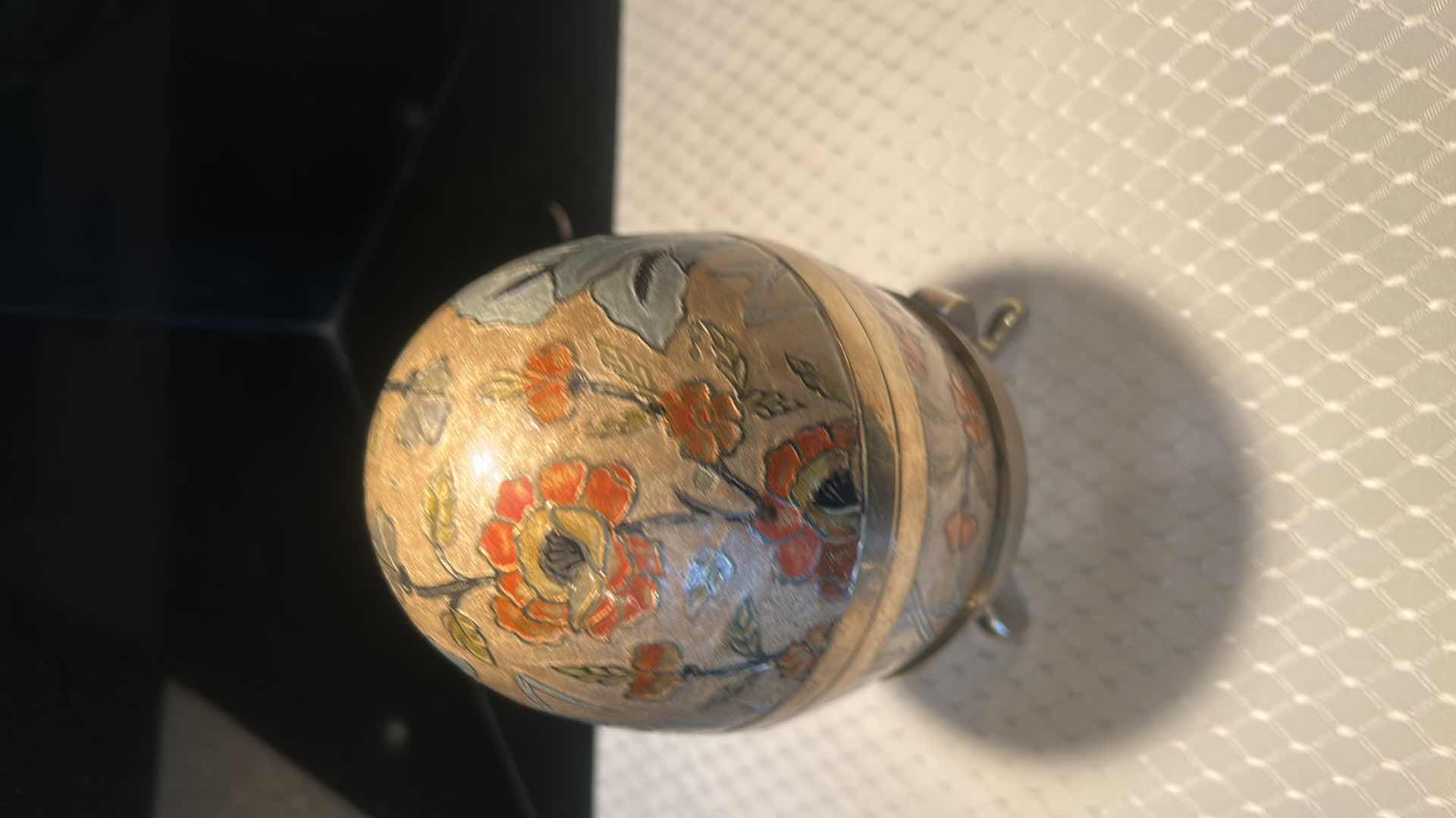 Photo 1 of LARGE HAND PAINTED BRASS EGG WITH BRASS STAND 7 1/4"