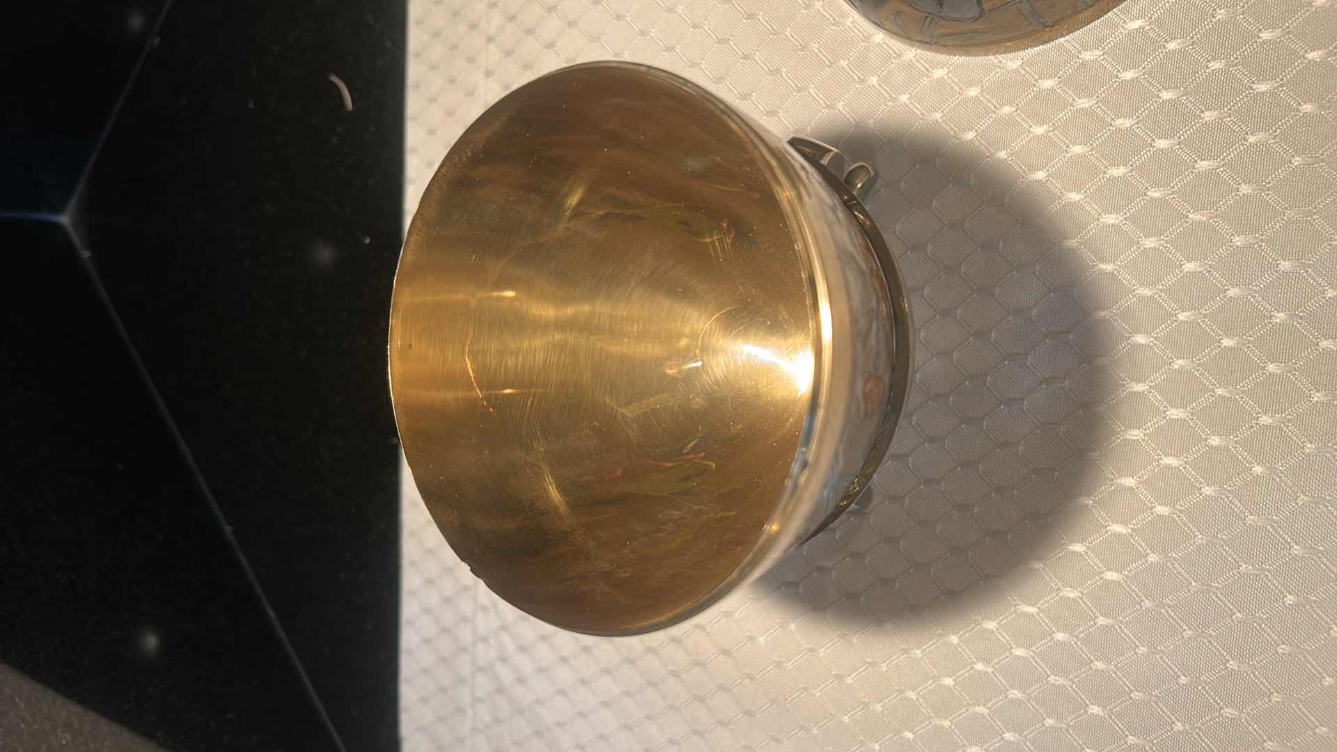 Photo 1 of LARGE HAND PAINTED BRASS EGG WITH BRASS STAND 7 1/4"