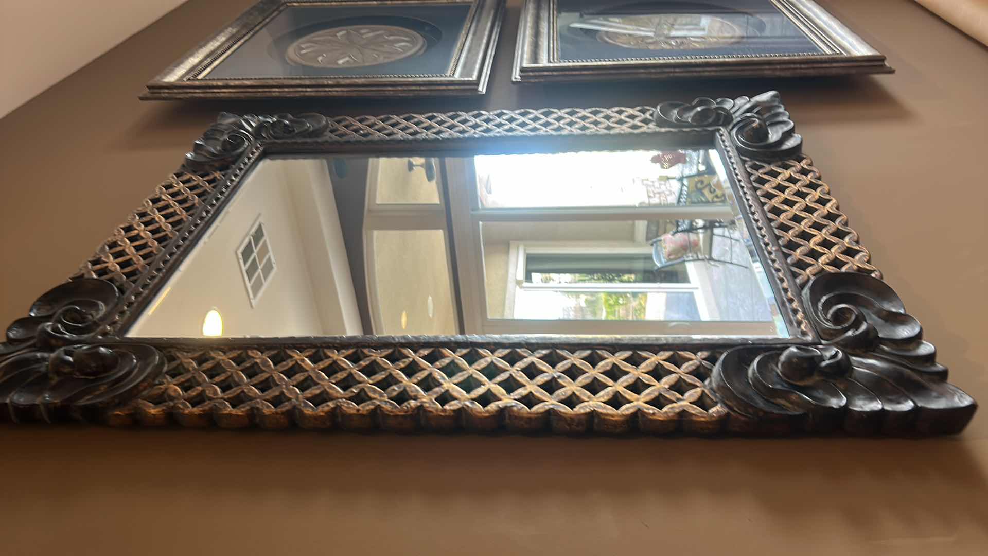 Photo 1 of ORNATELY FRAMED BEVELED GLASS MIRROR 
35” x 46”